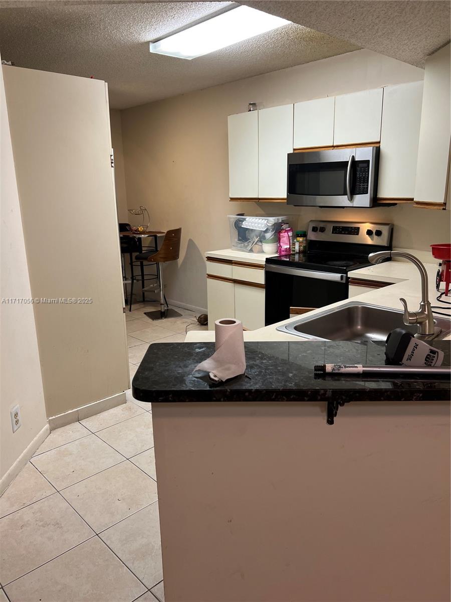 8871 Wiles Rd #208, Coral Springs, Florida image 2