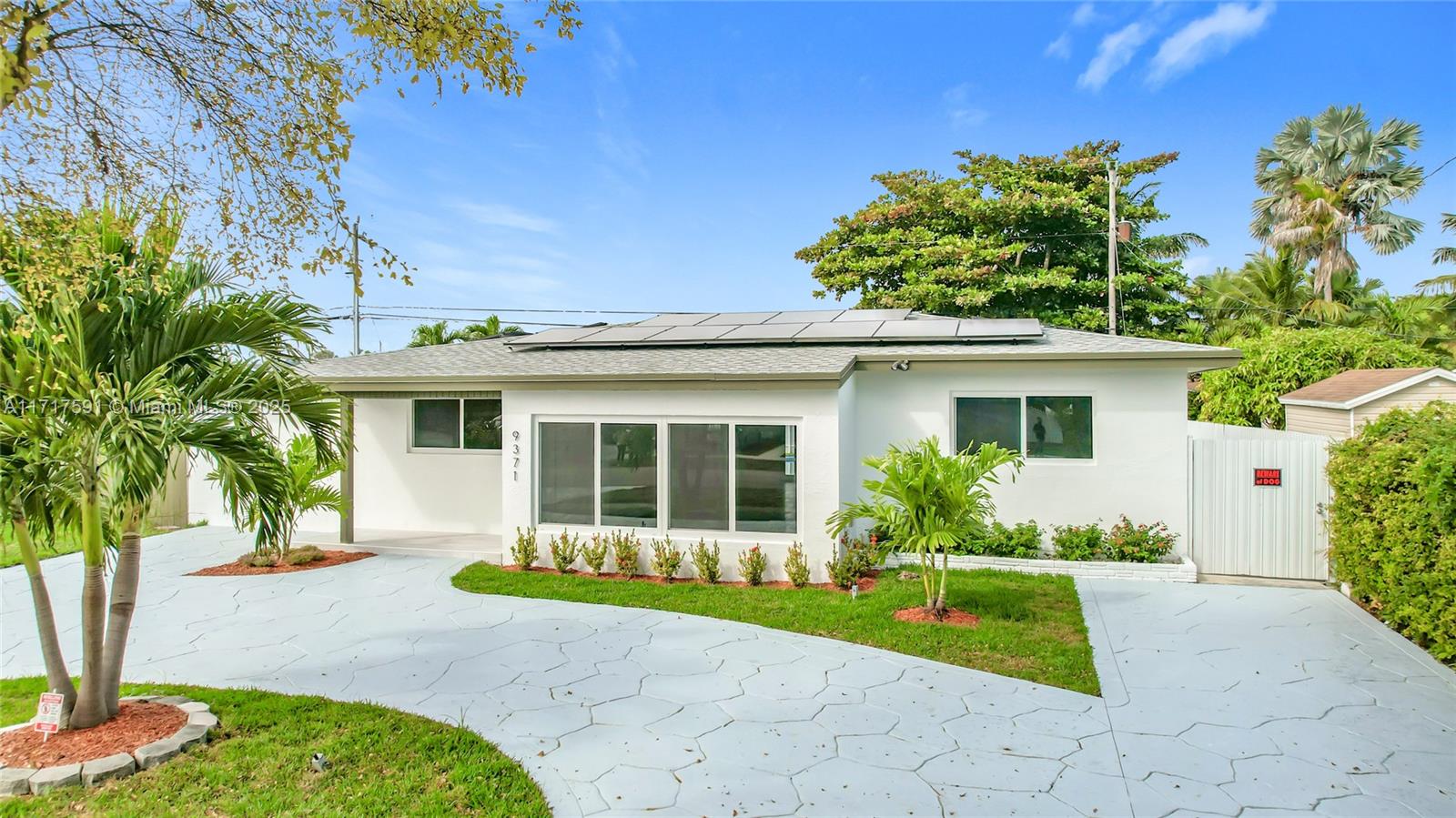 This stunning 4-bed, 3-bath pool home located in a desirable area of Cutler Bay, features an open floor plan with natural light, elegant Spanish/Italian porcelain floors, a new modern kitchen with quartz counters and luxury appliances. Includes new fully paid solar panels, roof (2022), impact windows, new AC, bathrooms have been elegantly remodeled with modern fixtures and finished, walking closet in Master Bedroom. The backyard offers artificial/natural grass, room for a Boat and RV, NO HOA, NO FLOOD ZONE. Conveniently near Marina, highways, shops, and restaurants. Also includes a large room with private entrance for office/in-law quarters. Easy to show, take advantage of this opportunity call and bring your best offer!