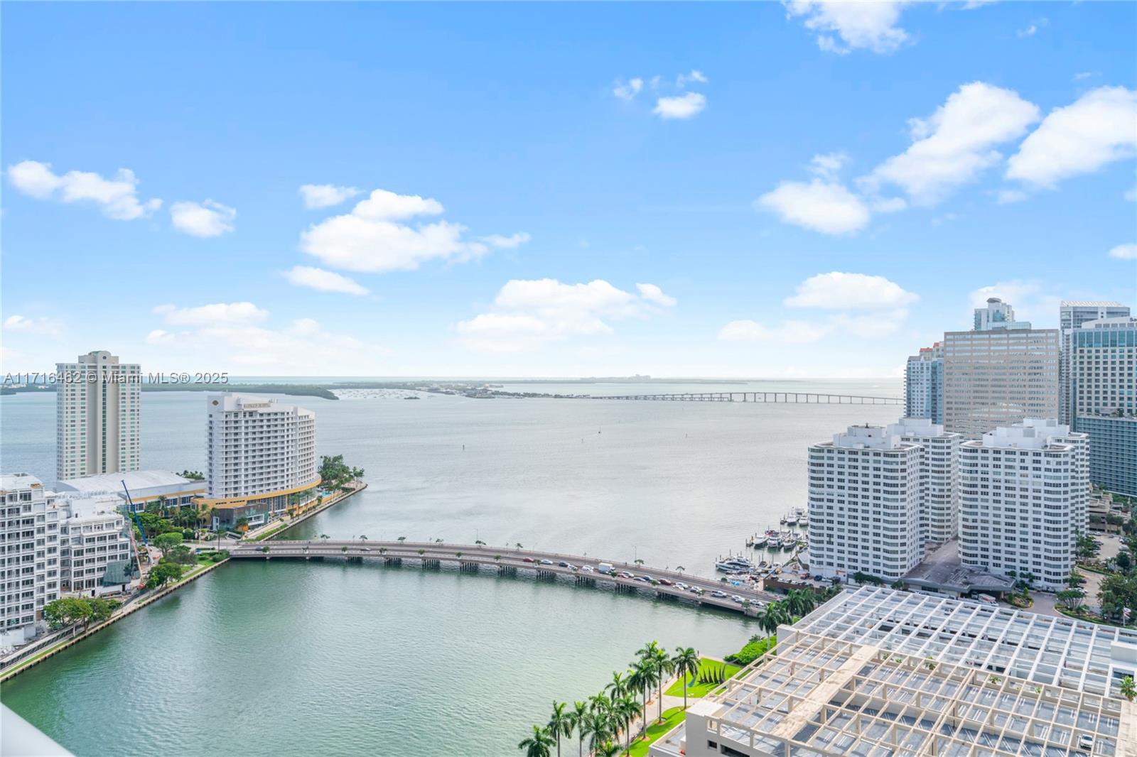 Discover breathtaking views of Biscayne Bay and skyline of Miami from the 27th floor of Icon Brickell's  Tower II. This desirable '09 line offers the largest 1-bedroom layout, showcasing stunning floor-to-ceiling windows. With 1,035 square feet of living space, a generous 148-square-foot balcony, and a combined area of 1,183 sqft as outlined by the developer, t. Additional features include a covered assigned parking spot and a wealth of building amenities, such as a famous spa and pool area, fitness center, social lounges, children's play area, and a golf simulator, all within a pet-friendly community  — It is currently occupied by tenants with a 60-day notice period for sale. Ok to lease first year with a minimum lease term of six months as per condo rules. No Airbnb  —  Open to offers!