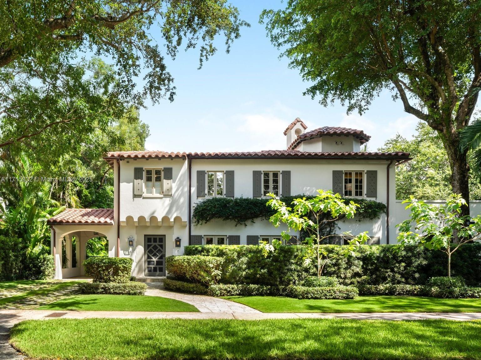 Designed by renowned Architect Phineas Paist, this historic estate blends timeless elegance and modern comfort. The 5-BD, 4.5-BA residence boasts a charming guest house on a sprawling 18,750 SF lot. Highlights include original Dade County pine and clay tile flooring, a grand entry with a historic front door, high-volume ceilings, and a custom gourmet kitchen. The captivating outdoor spaces offer a saltwater pool encased in coral rock, a cabana, terrace with wood-paneled ceilings, European tile, and Moorish accents. Additional conveniences include a water purification system, interior/exterior audio, 2-car garage, and impact windows/doors. Minutes from the Granada Golf Course and Coral Gables’ vibrant attractions, this estate offers a private retreat steeped in history and sophistication.