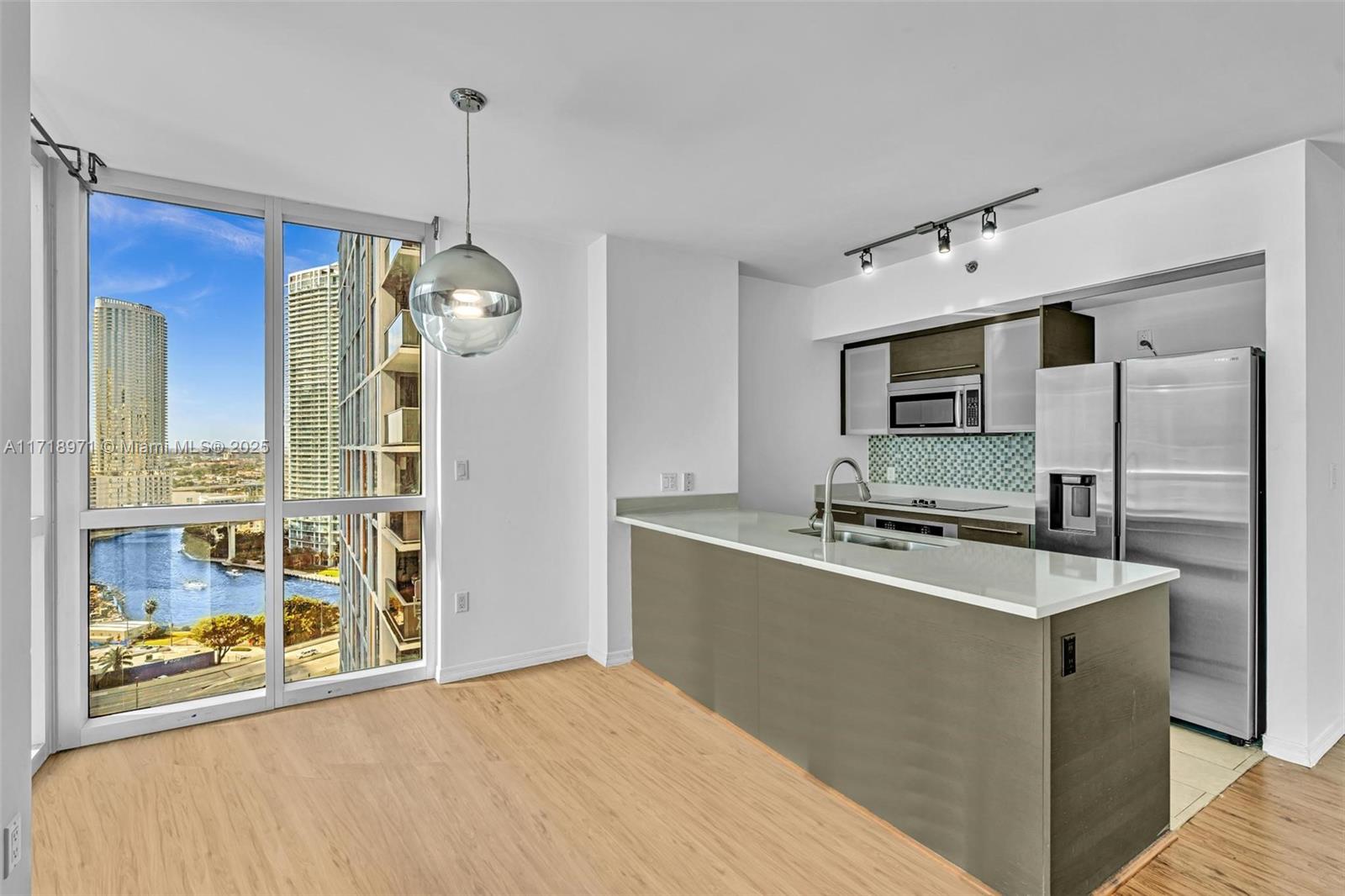 This RARELY AVAILABLE 2-bedroom, 2-bathroom corner unit on the 22nd floor of 500 Brickell West Condo offers sweeping city views and partial Miami River views. Meticulously maintained, the residence features recent upgrades, including a new AC system installed in 2023, refrigerator, washer/dryer, garbage disposal, and thermostat. Located within walking distance to Brickell City Centre, Downtown Miami, and a variety of dining and shopping options, it offers unparalleled convenience. Residents can enjoy top-tier amenities such as an 11th-floor pool with sundeck, fitness center, sauna, steam rooms, theater room, rooftop pool, wine cellar, and hot tub. This corner unit presents a unique opportunity in one of Brickell's most sought-after buildings. EASY TO SHOW!