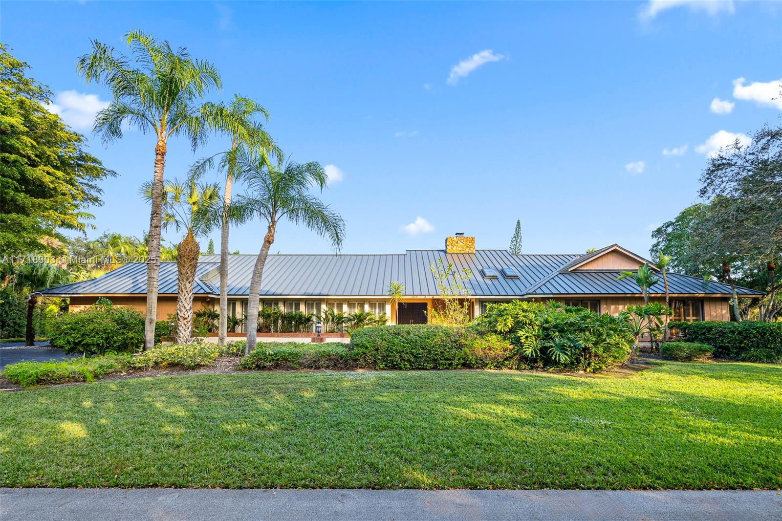 Discover this stunning 5-bedroom, 4.5-bathroom estate in the highly sought-after Pine Bay Estates South, located in the heart of Palmetto Bay! Situated on an expansive lot of over 30,000 square feet, this home offers a true South Florida lifestyle with a sparkling pool, private tennis court, and lush landscaping. Property features a brand-new aluminum roof, two new AC units, and recent termite tenting. The community provides roving security guard. Nestled in Palmetto Bay, a vibrant community known for its excellent schools, beautiful parks, and family-friendly atmosphere, this home is just minutes from dining, shopping, and recreational options like the Deering Estate and Biscayne Bay. Schedule your private showing today!