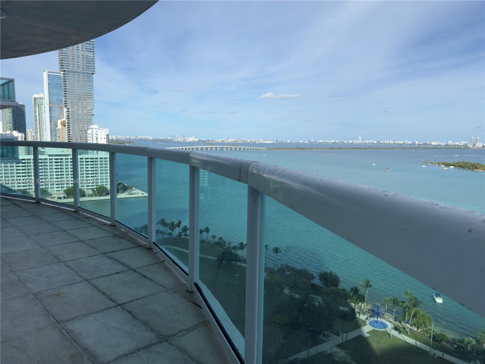 Breathtaking views of the Biscayne Bay in the heart of Edgewater. This beautiful  3 Bed/3 Bath is positioned in the most desirable line in the corner of the building, and has 2 parking spaces. The residence occupies 2,189 sqft with a huge bay front balcony in total 4 private balconies facing NE & SE with beautiful water views, floor-to-ceiling high-impact windows. All rooms offer custom built walk-in closets, shades & blackouts. 1800 Club Condo offers a state-of-the-art fitness center, sauna & steam room, swimming pool, hot tub and valet service. Walk to neighborhood cafes, restaurants, shops, and theaters. Only a 5 minutes' drive to the Design District and Wynwood, spectacular sunset views await you, adjacent to Margaret Pace Park with tennis, volley & basketball courts.