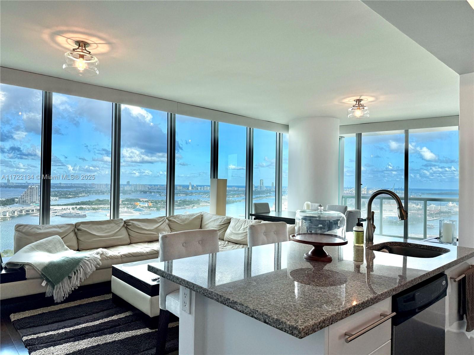 Beautifully furnished unit at Marina Blue on the sought-after Line 8, offering breathtaking views of Biscayne Bay, the Atlantic Ocean, and Miami Beach. This 2-bedroom, 2.5-bath residence features two assigned parking spaces and is fully furnished with custom window treatments, built-in closets, Italian kitchen cabinetry, and luxurious marble baths. Marina Blue is a premier, full-service building with exceptional amenities, including two expansive pools, a spa, gym, yoga room, mini golf, and a beach volleyball court. Ideally located just steps from Bicentennial Park, Bayfront Park, the PAMM Museum, the Kaseya Center, and more!