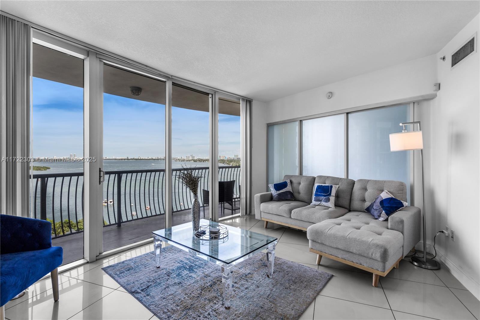 This beautifully furnished 2-bedroom, 2-bath condo offers breathtaking bay and city views from the 17th floor. With modern finishes, an open layout, and a private balcony, enjoy Miami's skyline and waterfront ambiance. Located in the heart of Edgewater, you'll be steps from Margaret Pace Park, fine dining, and entertainment. Building amenities include a fitness center, resident's lounge room and 24/7 security. Available for a 1-year lease—ideal for those seeking comfort, convenience, and sophistication.