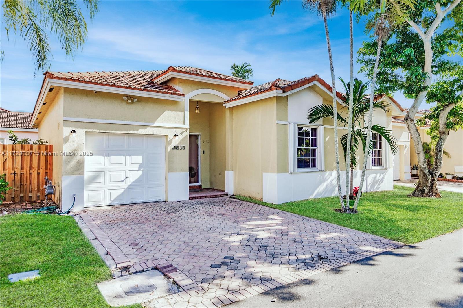 This beautifully updated home is located on a cul-de-sac in the desirable Cutler Bay. This move-in-ready property features a modern open floor plan with a split bedroom layout for enhanced privacy. Enjoy 24-inch modern tiles, an updated kitchen, and a spacious primary suite with a luxurious walk-in shower. The low-maintenance turf backyard is fully fenced and the home is equipped with accordion shutters. Situated just minutes from the Turnpike, commuting is a breeze. The community offers a pool, multiple parks, and scenic walking paths. Located in golf-cart-friendly Cutler Bay, this home is near Black Point Marina and the exciting upcoming Legacy Park, a future hub with shops, dining, and entertainment. Experience modern living in a growing, vibrant town!