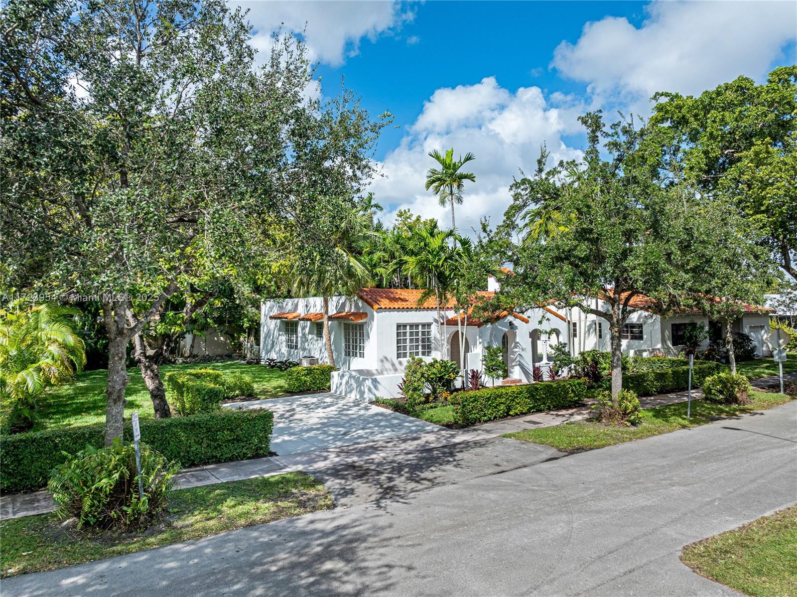 Beautiful Old Spanish 3 bed, 2 bath home in Coral Gables on the tree-lined street Lorca. Features a spacious open floor plan with living, dining, and family rooms, plus a charming fireplace in the living room. Large bedrooms with plenty of closet space for storage; the master includes an en-suite bathroom and walk-in closet. Tile floors throughout, plumbing & electrical has been updated, no crawl space. Enjoy a covered front porch, oversized lot with ample parking, and space for a pool. Perfect blend of charm and function in a prime location! Property has updated PVC plumbing, updated electrical, a new tankless water heater and new appliances in the kitchen.