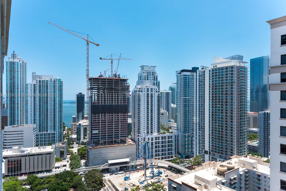 Stunning 2-bedroom, 2-bathroom unit with a fantastic location offering views of the pool and city. Features include upgraded wood and porcelain floors, a modern kitchen with granite countertops, Italian lacquer cabinets, and stainless steel appliances. Experience urban living in the heart of Brickell, with Publix, Mary Brickell Village, and top restaurants just steps away. Enjoy excellent amenities. Available for long-term lease (1 year minimum).