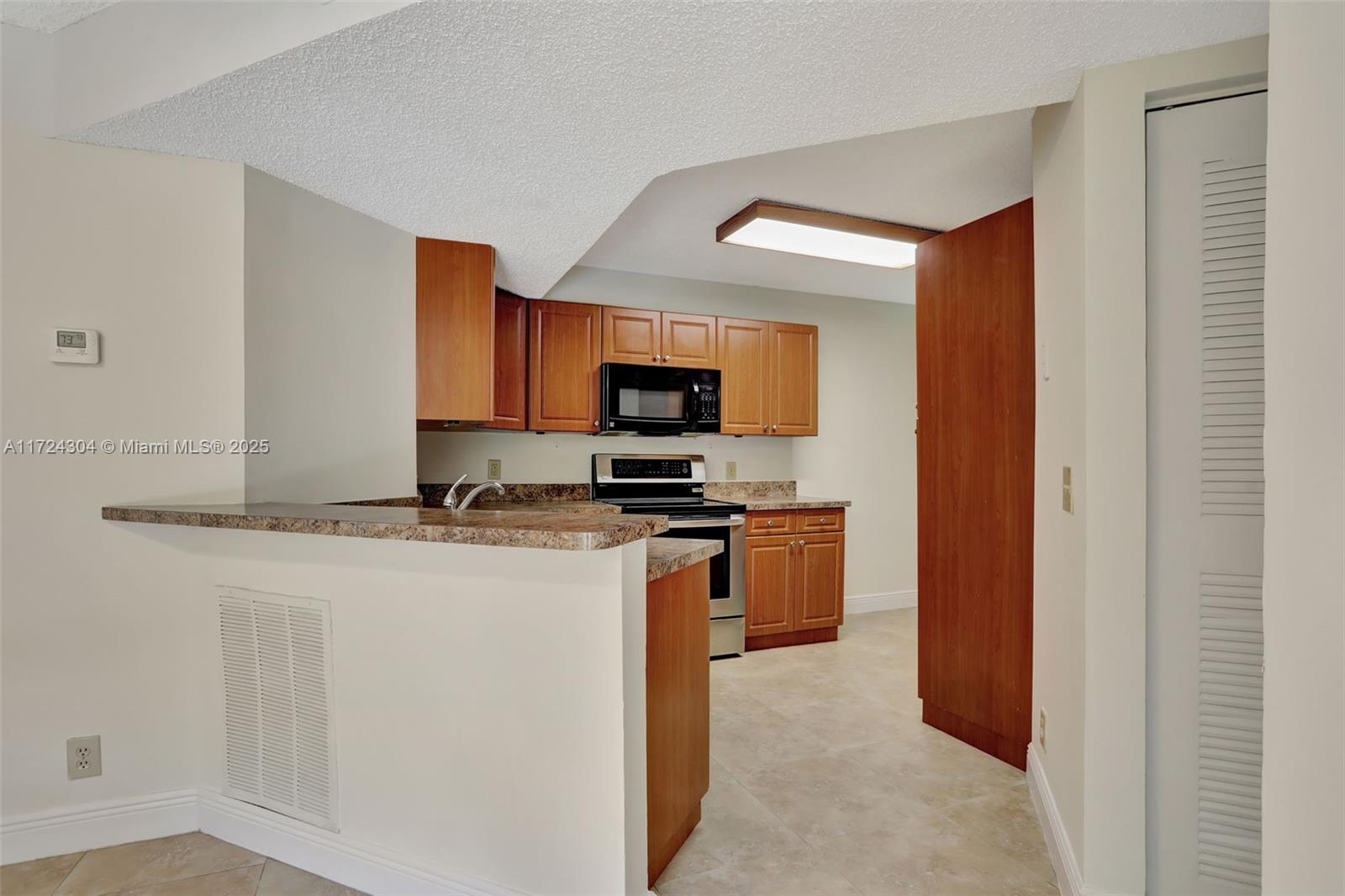 8891 Wiles Rd #102, Coral Springs, Florida image 3