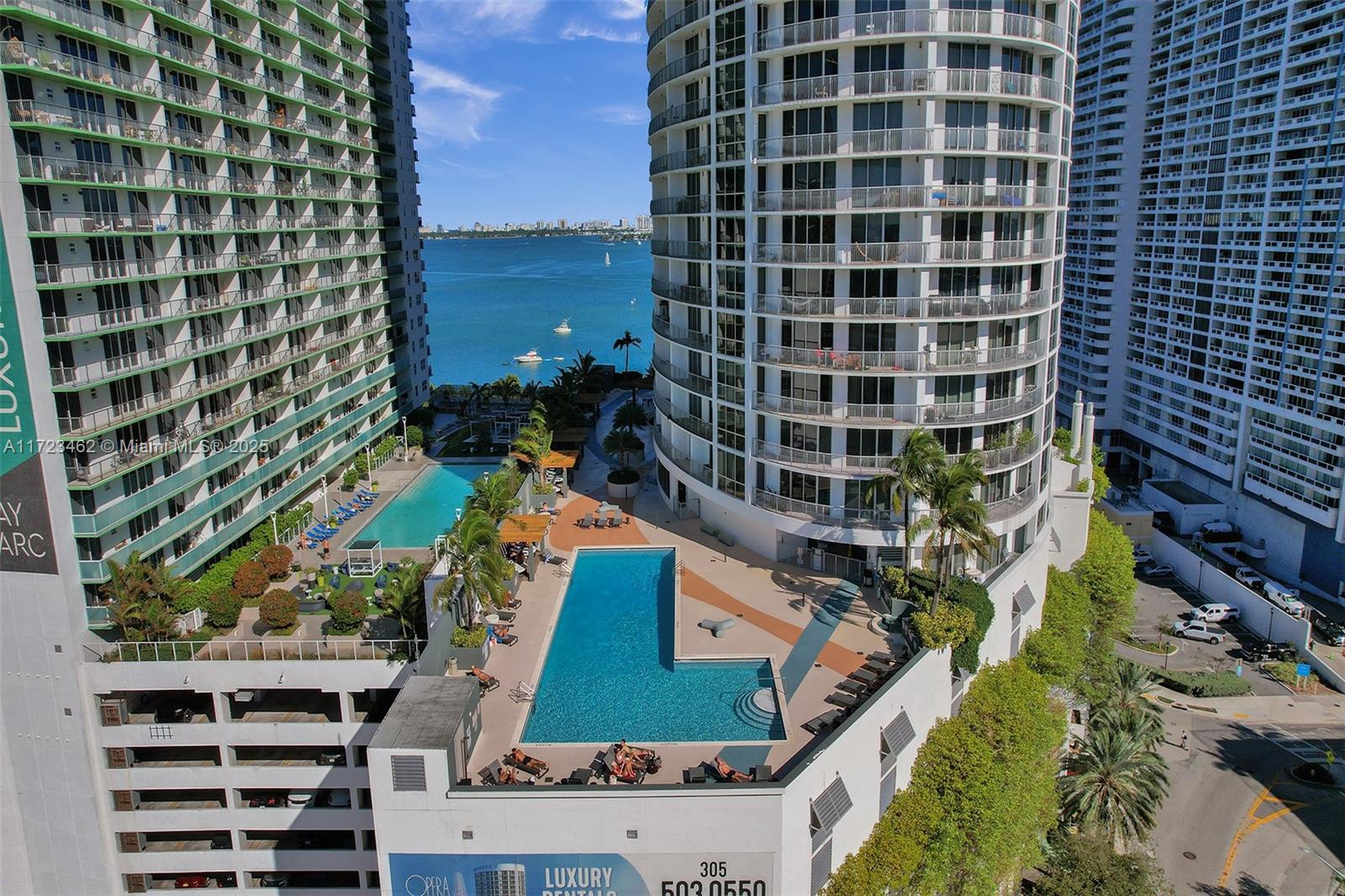 This beautiful unit in Opera Tower offers breathtaking views of Biscayne Bay. It is located in the heart of Miami, within walking distance of restaurants, Shops, and entertainment venues.
Top amenities include a pool, fitness center, and 24/7 concierge service. This high-floor unit provides peace, privacy, and panoramic city and Bay views. Close to Downtown Miami.Wynwood, and Miami Beach.Ideal for those seeking a mix of urban convenience and waterfront tranquility.