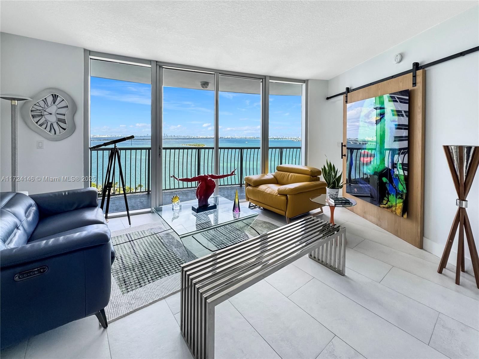 This turnkey luxurious 2-bed/2-bath condo is located in the best line of the iconic Opera Tower, offering a direct and unobstructed panoramic view of Biscayne Bay. From the moment you step into this newly renovated residence, you’ll be captivated by its sleek modern design, high-end finishes, and an open-concept layout that maximizes natural light and highlights the stunning water views from every room. The spacious living area flows seamlessly onto a private balcony, perfect for enjoying breathtaking sunrises or watching boats glide across the bay. Opera Tower is located in the heart of Edgewater, just minutes from South Beach, Downtown Miami, Brickell, Wynwood, the Design District, and Miami Airport. This is more than a home; it’s a front-row seat to the beauty of Miami’s waterfront.