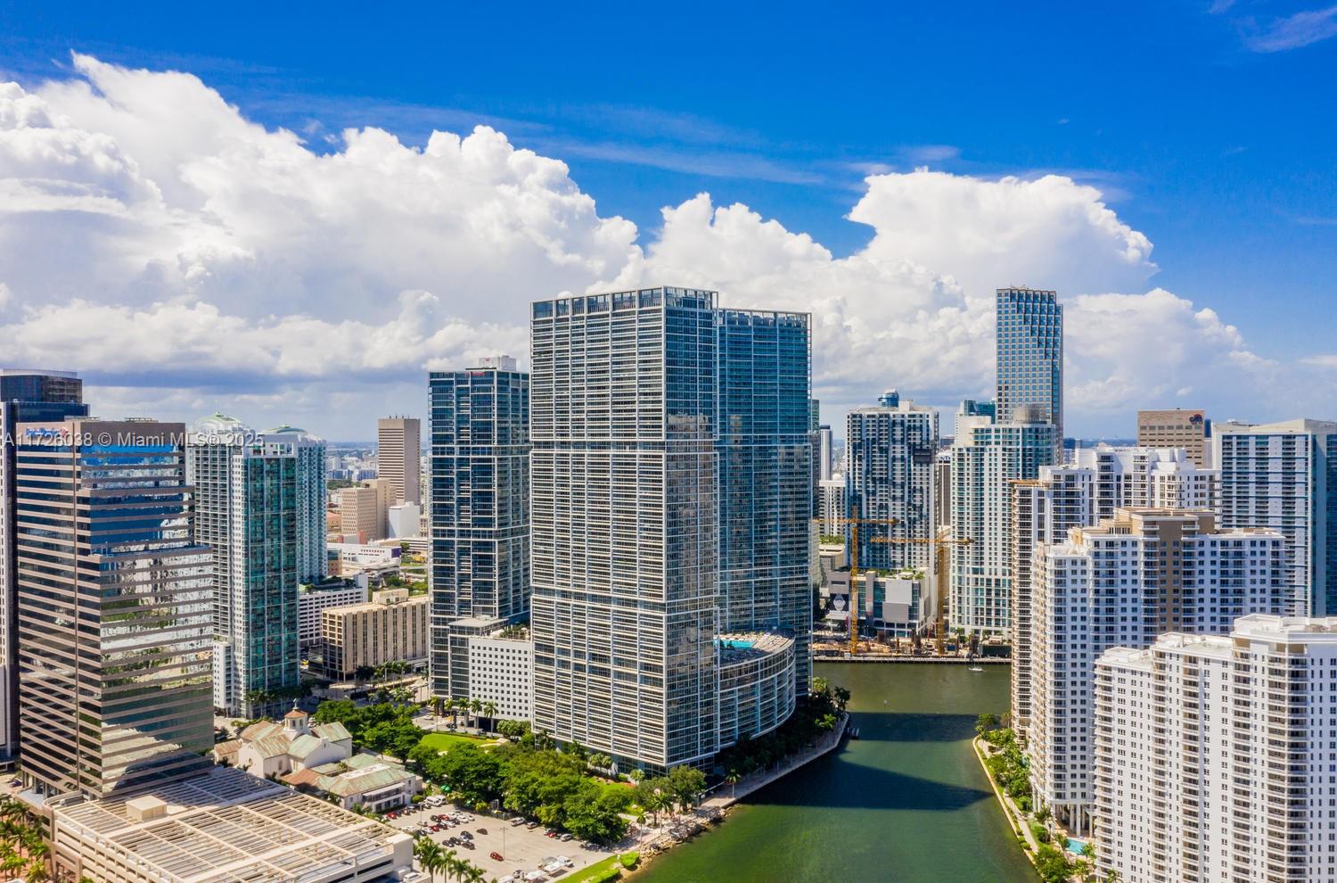 Embrace luxurious living in Brickell's Icon Building with this studio! Delight in exquisite interiors and captivating views. Swim in the oversized pool or lounge on the deck with a serene outlook over Biscayne Bay. Treat Yourself at a top-tier spa and fitness center, featuring three whirlpool tubs, cold plunge pools, a steam room. and redwood saunas offering a full wellness experience. Walk, jog, or unwind in the nearby parkson the expansive two-acre terrace overlooking the bay : complete with a 300-foot pool, hot tub, and outdoor fireplace. Enjoy two bayside restaurants, 24-hour concierge service, and the convenience of same-level parking. All enhancing your dynamic urban lifestyle. Your new home boasts panoramic views of downtown Miami and beyond.