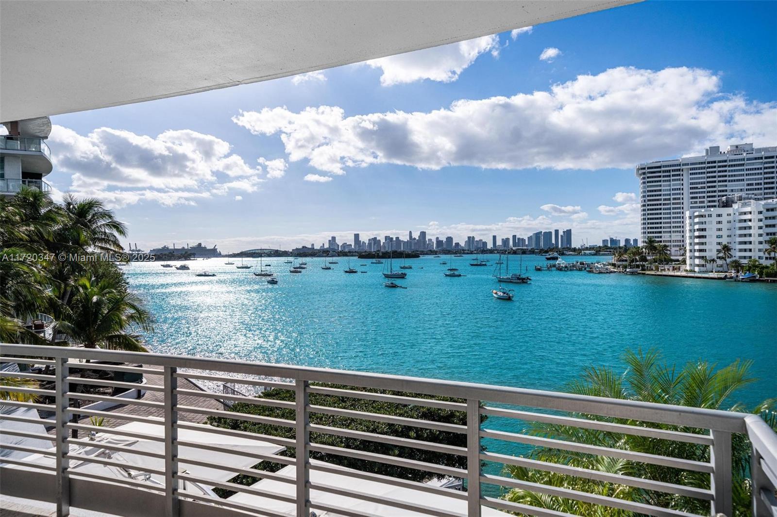 Immerse yourself in endless panoramic skyline & Bay views from this sought-after 02-line residence at Capri South Beach! This remarkable corner unit features an expansive wraparound terrace, perfect for entertaining. Inside, elegant marble finishes create an atmosphere of refined luxury. The gourmet chef's kitchen showcases a stunning marble island paired w/high-end Wolf & SubZero appliances. The primary suite is a haven of luxury, offering a custom walk-in closet & a spa-like bathroom w/rainfall shower, bidet, & dual stone sinks. Capri South Beach delivers boutique living with exclusive amenities, including a fitness center, Bayfront pool/jacuzzi, valet, & baywalk access. Situated steps away from Sunset Harbour, Lincoln Road, SOFI, & more. Docks available for rent/purchase.