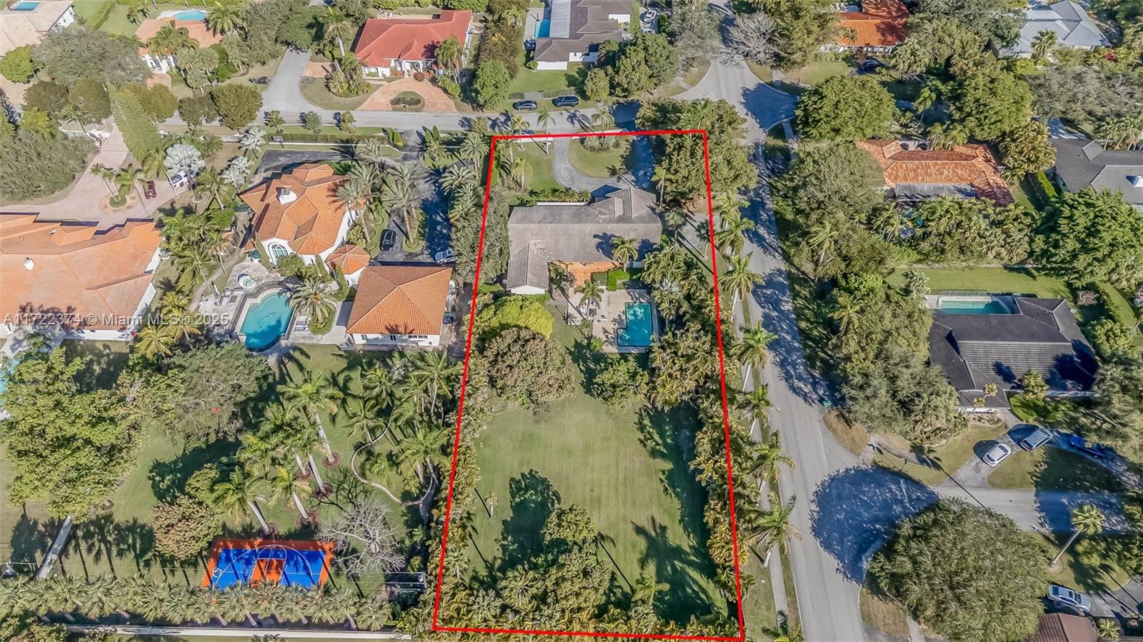 Situated in the highly coveted North Pinecrest neighborhood, this expansive 38,768 SF lot is a developer’s dream. The property features a 2,804 SF home with 3 bedrooms and 3 bathrooms, ideal for renovation or as a teardown to build a custom luxury estate. No protected trees in center of the property. Zoned EU-1 (Single-Family One-Acre Estate Use), the lot offers ample flexibility for development, including a maximum building coverage of 30%, a minimum green space requirement of 35%, and generous setback allowances. Located near top-rated schools, fine dining, and premier shopping, this property combines location and potential to create a truly exceptional home.