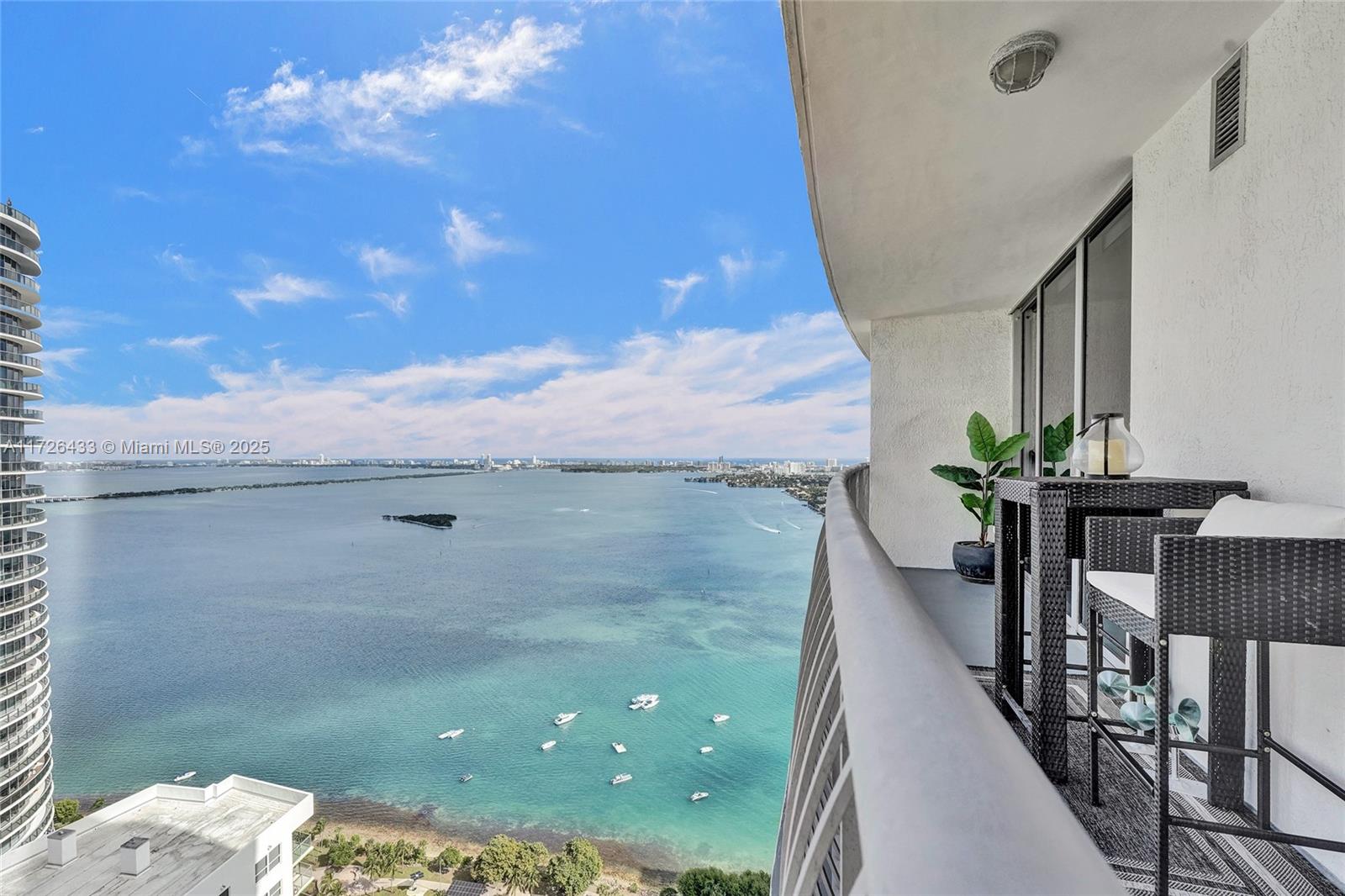 This fully furnished 1-bedroom condo offers stunning views of the bay and ocean, located in a vibrant energetic community. Inside features ample natural light, and a spacious bedroom with bay views. The kitchen is fully equipped, perfect for cooking and entertaining. Across the street, enjoy a variety of restaurants, a park, tennis courts, basketball courts, volleyball courts, an outdoor gym, and a playground—everything you need for an active lifestyle is in your backyard. Ideal for those seeking both convenience and tranquility in a prime location.