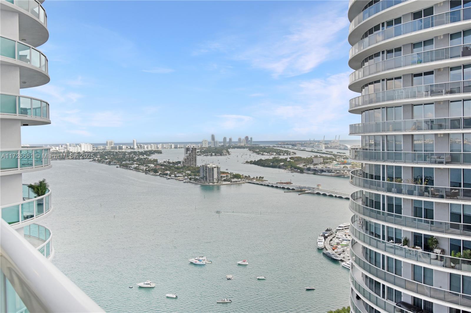 VERY LARGE 2BR/2BA with 1,374 SF condo at 1800 Club featuring stunning Biscayne Bay views from a large private balcony. This bright unit boasts an open floor plan with abundant natural light throughout, three walk-in closets, blackout shades in the rooms, sheer shades in the living room, kitchen with stainless steel appliances, a new A/C unit and new water heater.  Unit comes with one assigned parking space. 
****All amenities in the building are working (pool, sauna, steam room, gym, game room, party room)****
Located in front of Margaret Pace Park near Wynwood, Adrienne Arsht Center, and the Metro Mover. Walking distance to Publix and local dining options.