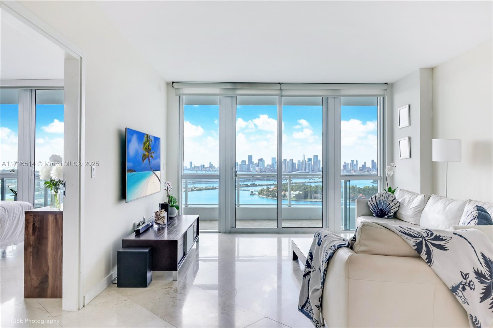 Stunning residence at Bentley Bay, offering breathtaking, unobstructed views of Biscayne Bay, Downtown Miami, and the ocean.European-designed kitchen with top-of-the-line stainless steel appliances, marble bathroom, floor-to-ceiling windows, and a spacious private balcony that fills the unit with natural light. Enjoy Resort-style living in this boutique bayfront building with 24-hour concierge, valet, a bayfront swimming pool, jacuzzi, fitness center, sauna, and steam room. Located in the heart of South Beach, steps from South of Fifth, Whole Foods, Publix, world-class restaurants, shops, and the beach. Across from the new Canopy Park, with easy access to Downtown Miami, Brickell, the Design District, and Miami International Airport. 30-day rentals permitted, Boat docks available for rent.