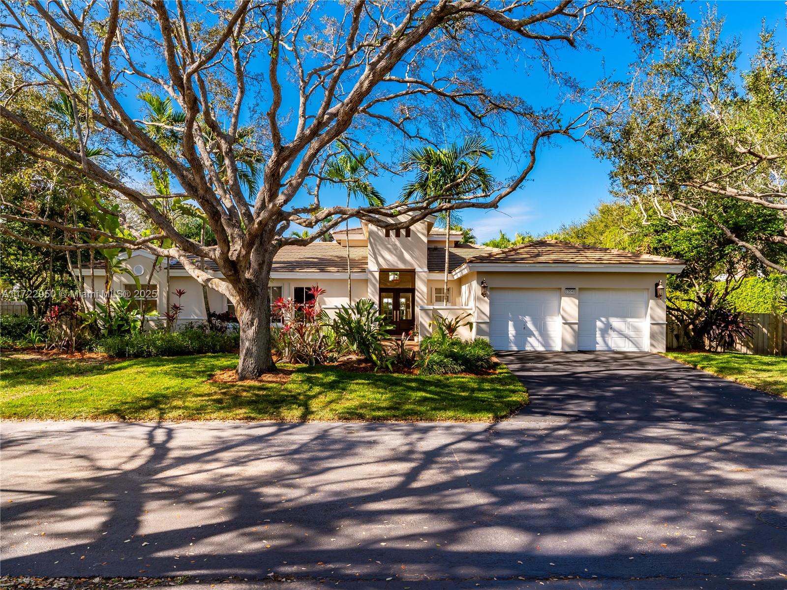 Majestic oaks lead the way to this freshly painted, turnkey home in gated Old Cutler Cove. Smartly designed for easy one-level living, the covered entry leads to a gracious foyer and sunlit living room with soaring ceilings and a view of the saltwater pool and patio. Open kitchen with an island and counter seating, granite countertops, and plenty of cabinets. The family room has French doors to the patio and a screened-in terrace. The spacious primary has walk-in closets and a luxe ensuite bathroom. A formal dining room, 3 guest bedrooms, a cabana bath, a half bath, laundry, and a garage complete the interior. Relax and unwind in the peaceful, fenced backyard with room for sports. New AC and new irrigation. Top-rated schools. Steps from Coral Reef Park. Your opportunity is now!