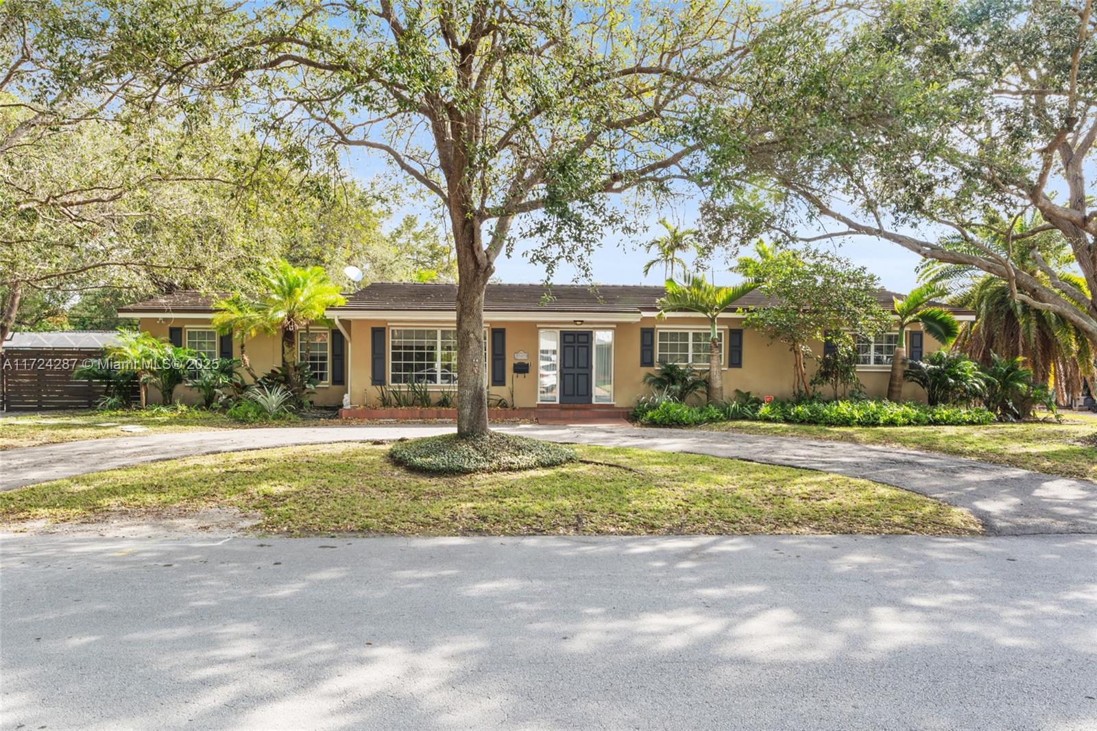 Welcome to this stunning 4-bedroom, 3-bathroom pool home in the highly desirable Palmetto Bay! Nestled on a generous lot adorned with beautiful trees, this residence strikes the perfect balance between privacy and accessibility. Its thoughtfully designed split floor plan offers both seclusion and convenience, featuring three bedrooms in the primary wing, complete with a cabana bath, while an in-law suite on the opposite side is perfect for guests or extended family. The expansive backyard serves as an ideal retreat, featuring a sparkling pool and a spacious patio for outdoor enjoyment. This move-in-ready home promises peace of mind for years to come. Families will love the close proximity to top-rated schools, all within walking distance, making daily commutes effortless and convenient.