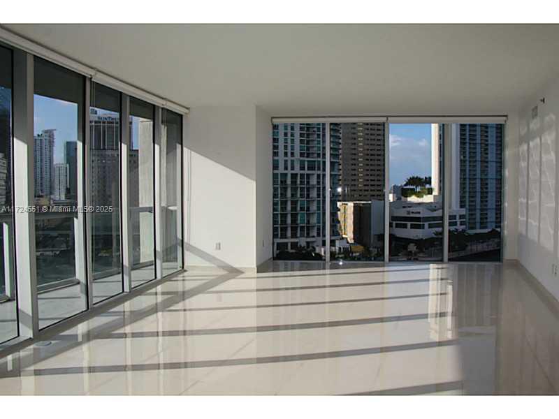 A MUST SEE!!! BREATHTAKING MAGNIFICENT VIEWS OF THE BAY, PORT OF MIAMI, MIAMI RIVER, AND SKY LINE. LARGE AND SPACIOUS UNIT WITH EXCELLENT FLOOR PLAN. BEAUTIFUL WHITE PORCELAIN FLOORS AND TOP OF THE LINE APPLIANCES WITH ITALIAN CABINETRY. EXPERIENCE MIAMI'S BEST DESTINATION IN THE HEART OF BRICKELL/DOWNTOWN AREA. FULLY EQUIPPED WITH PARKS, POOL, 2 JACUZZIS, SPA, GYM, RESTAURANTS, NIGHTCLUB AND MUCH MORE. ENJOY LIVING IN THIS PROJECT OF SUCH GRAND PROPORTIONS AND SO PERFECTLY LOCATED.