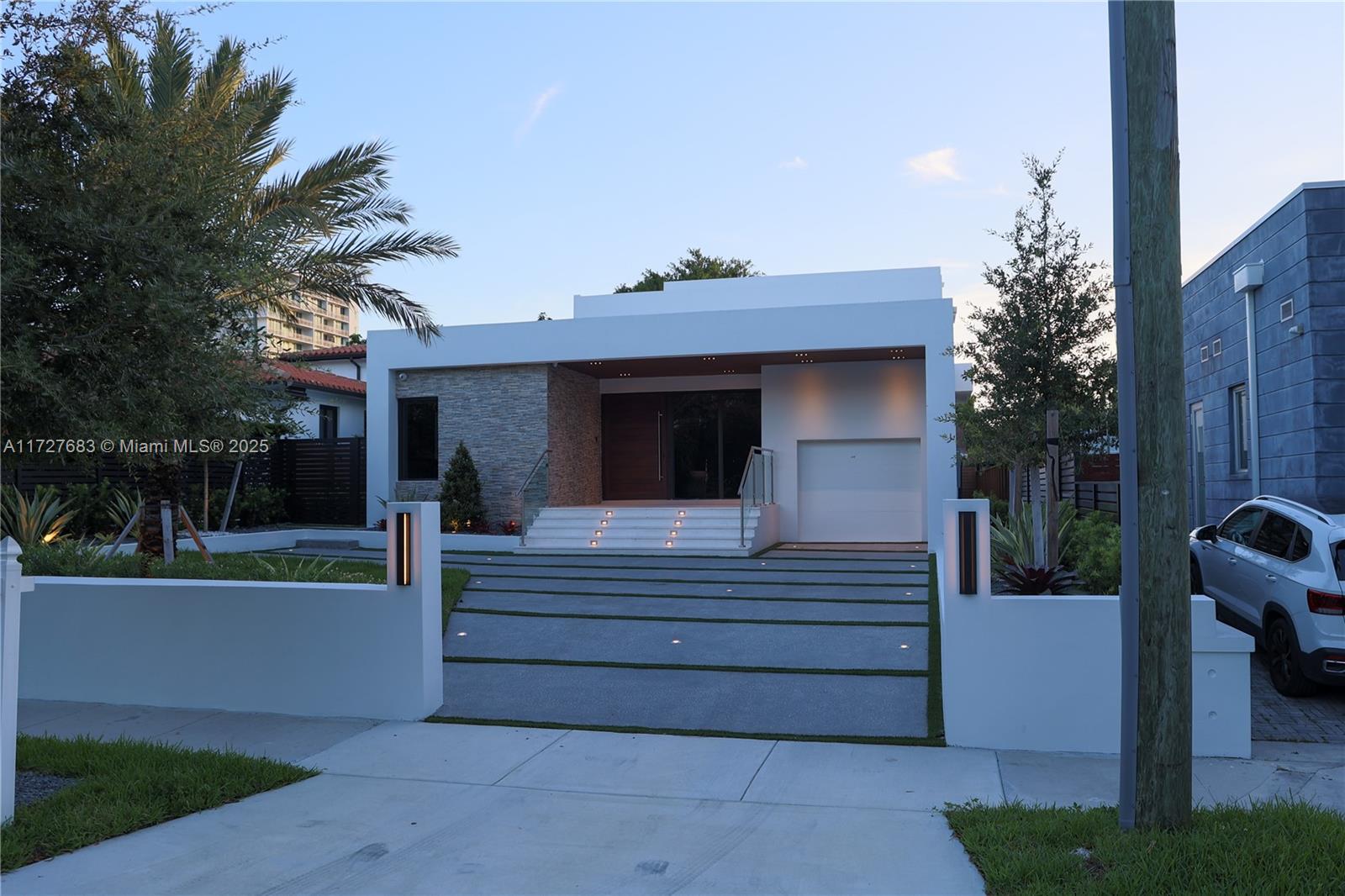 Brand new modern masterpiece in the highly sought after neighborhood "The Roads", steps away from Miami's best shopping & restaurants. Pull into your gated Driveway featuring recessed inground lighting, surrounded by a lush garden & Space for up-to 4 cars + garage. Enter through a grand pivot door into an open layout with impeccable attention to detail, this two story home spans 3,500 sqft with 4 bedrooms & 5 full bathrooms. Trimless doors & recessed linear lighting for a seamless look throughout the home. Beautifully designed kitchen with top end Bosch appliances & custom wet bar. All ensuite bedrooms w/ built out closets & luxurious bathrooms, featuring Brizo hardware & custom vanities. Spacious terrace with built out summer Kitchen, pool & full cabana bathroom. Full security system.