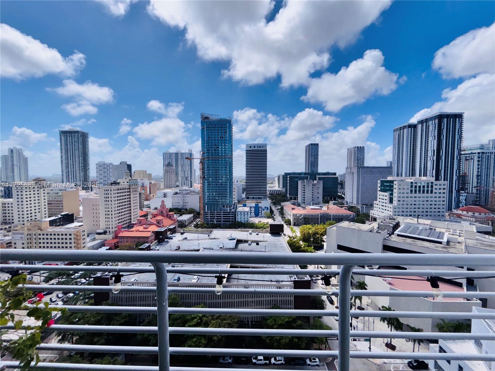 This beautiful 1-bedroom, 1-bath loft, located on a high floor, is fully furnished and perfect for urban living! The unit features stunning stained concrete floors, stainless steel appliances. Natural light pours in through impact-resistant sliding glass doors, enhancing the open feel. The spacious, private large balcony offers breathtaking views of the city and is perfect for relaxing or entertaining.
Recent upgrades include a brand-new AC unit and an extended door frame. The bedroom offers added privacy with a full wall, replacing the traditional loft style.
Building amenities include 24-hour security, a pool, gym and sauna. Parking is available for $60 per month at the Miami Dade garage across the street. Don’t miss out on this stylish, centrally located home! 6 Month to 1 Year lease.