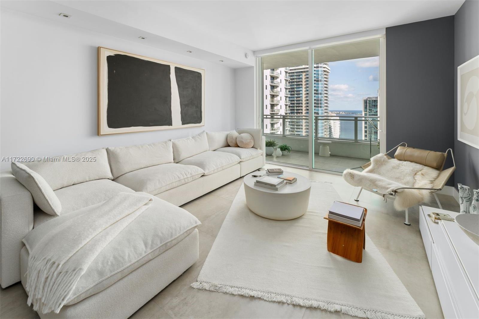 Located in the heart of Brickell, this contemporary 1-bedroom, 1.5-bathroom condominium at the luxurious Bond is a must-see. Residence 3404 includes expansive views of Biscayne Bay along with floor-to-ceiling windows, and has been meticulously upgraded to include an oversized walk-in closet, custom lighting, porcelain flooring that extends on to the double-wide balcony and window treatments throughout. Kitchen features include a full suite of Bosch appliances, European style cabinetry and silestone countertops. The Bond boasts a Starbucks onsite, a fitness center, a spa with a sauna and steam room; an outdoor pool deck with cabanas and summer kitchens; a children's play room; and an executive business center. Unit can be purchased furnished with designer collections for additional cost.