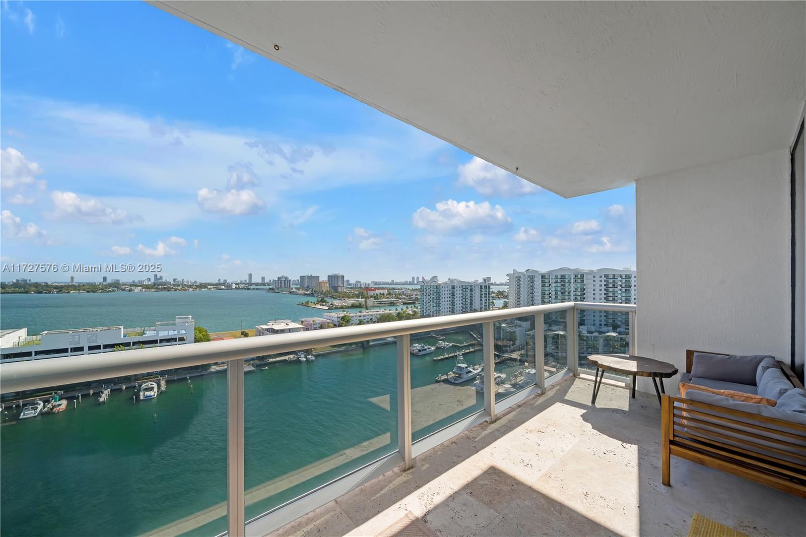 Enjoy breathtaking water views from EVERY room in this rarely available high-floor corner unit at Blue Bay Tower. The spacious living room features floor-to-ceiling windows showcasing stunning vistas of the bay, ocean, Miami Beach, and Downtown. This thoughtfully designed unit includes 3 bedrooms, 2.5 bathrooms, and a den, all tastefully appointed.
Blue Bay Tower is a modern boutique building located in the heart of North Bay Village, offering a beautiful rooftop pool and gym, conveniently situated minutes from the beach, downtown and the airport. The unit offers lots of storage and includes 2 parking spaces. Rents includes Cable/internet, water and all amenities. Unit can be rented furnished or unfurnished.