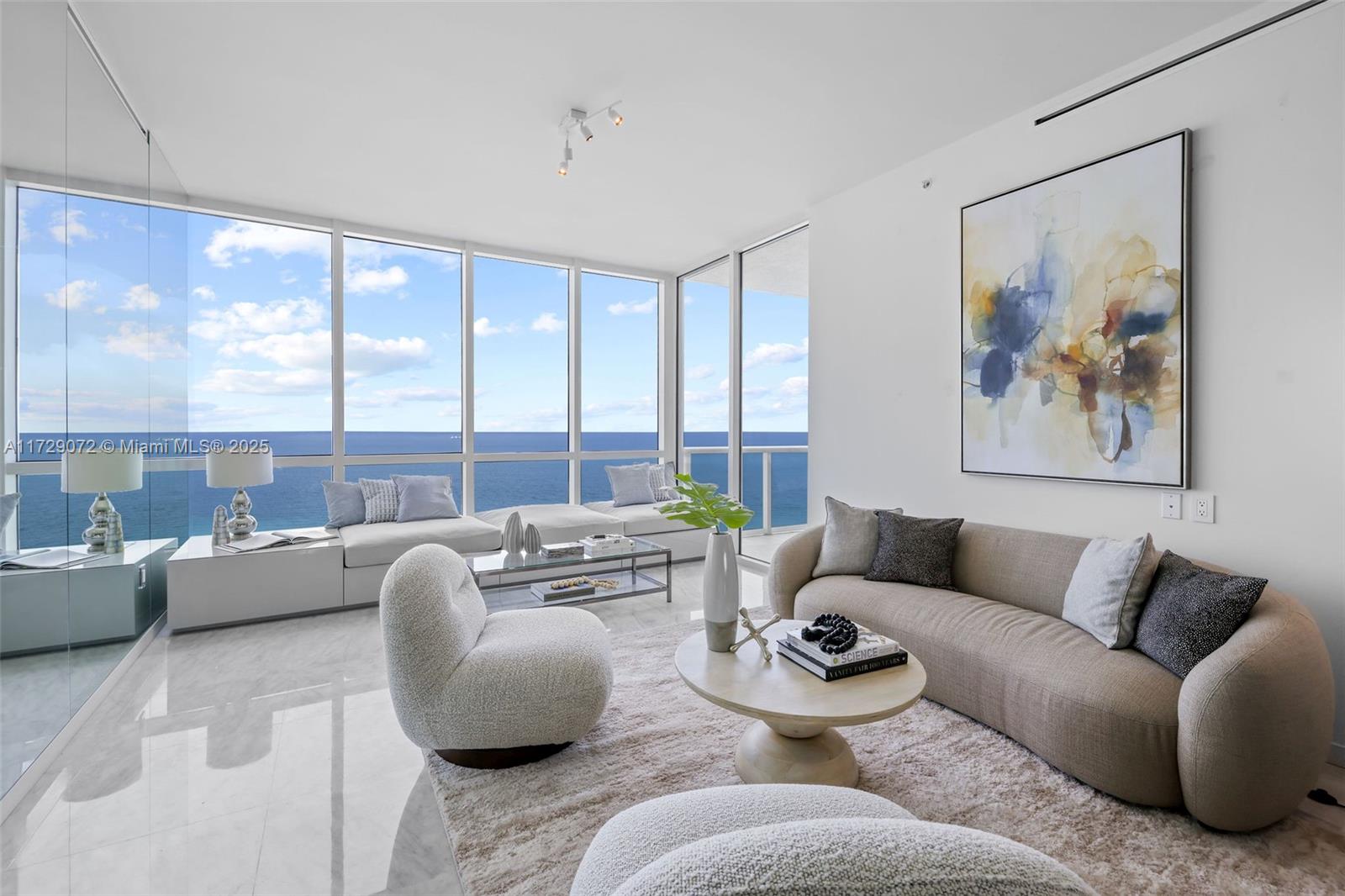 Indulge in coastal elegance at this RENOVATED ultra-luxury oceanfront condo. Panoramic views of the ocean set the stage for modern living in this meticulously renovated 2-bed, 2.5-bath residence. Floor-to-ceiling windows flood the space with natural light, seamlessly merging the sleek kitchen, inviting living area, and dining space. The primary suite offers a tranquil escape, complemented by a spa-like ensuite including ample walk-in closet space. A private balcony invites al fresco moments with endless sea vistas. The Continuum 12 Acre South Beach ocean front property is second to none amenities and beauty wise on FL's Gold Coast located in the prestigious South of Fifth Area.