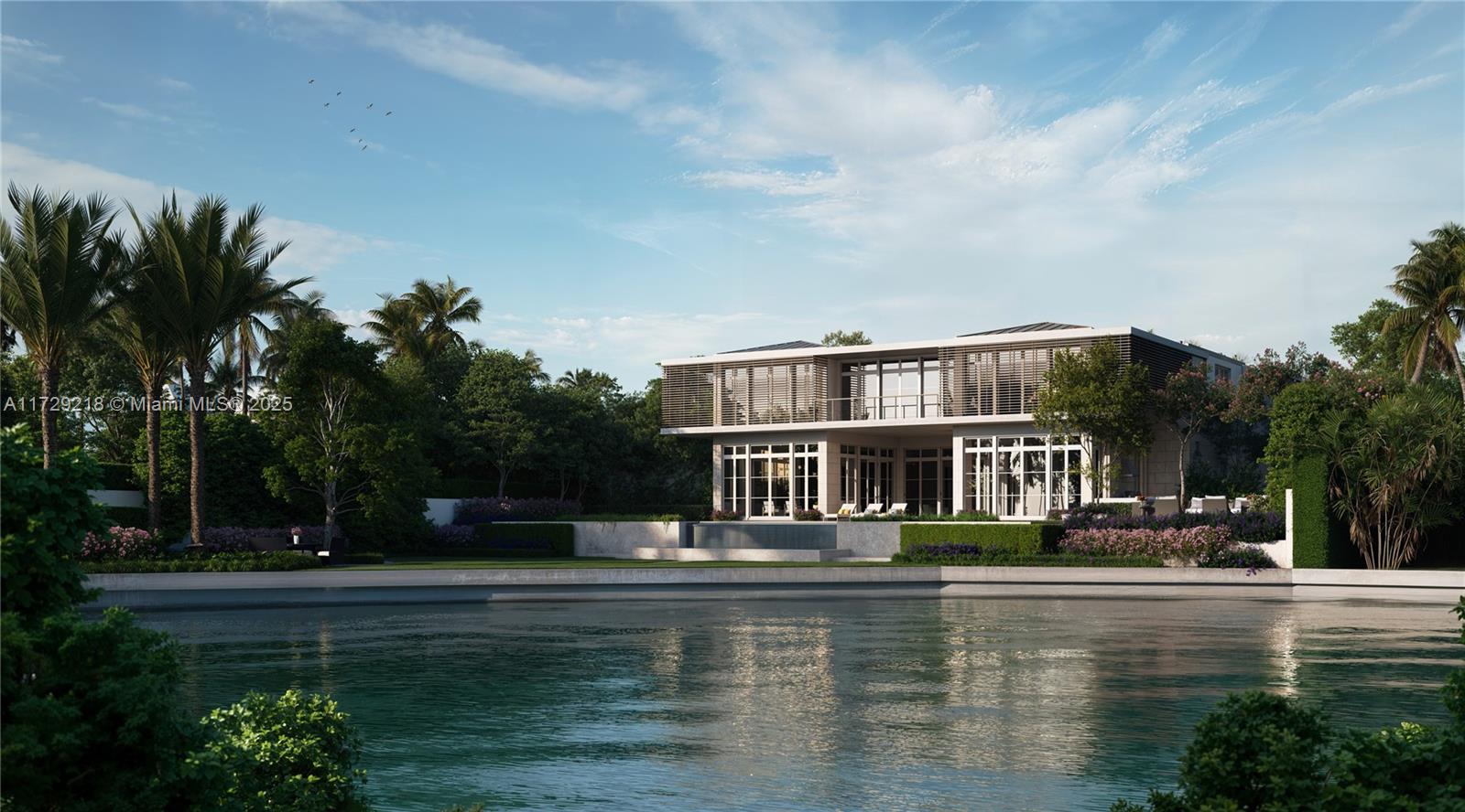 Located in the prestigious Gables Estates, this extraordinary waterfront pre construction estate, designed by renowned architect Rafael Portuondo, spans 43,925 sq ft of land with 150 ft of water frontage and 13,139 sq ft of interior space. The property features two expansive master and junior suites, 8 bedrooms, 10 bathrooms, an elevator, 8-car garage, gym, movie theater, media room, and whiskey/library room. The gourmet kitchen includes a separate dirty kitchen and two staff rooms. Two pools, Outdoors, enjoy two pools, a covered terrace, BBQ area, and spacious patio. The second floor offers an art gallery, family room, laundry, and three terraces with water access. City permits approved ready for construction. House to be delivered 2026