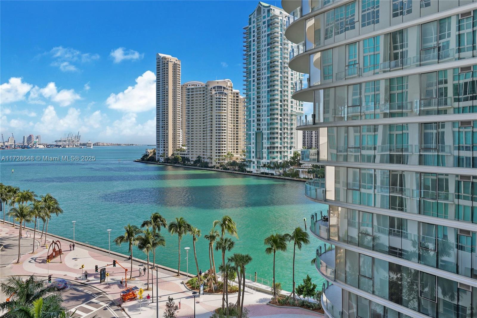 Rarely available 2 bd  2.5-bath two-story loft with a large living area, expansive ceilings, and floor-to-ceiling windows. Features complete primary suites on each level with a sitting area and stunning views of Biscayne Bay, the Boulevard, and the Aston Martin building. Southern exposure fills the space with natural sunlight. The spacious loft boasts an open kitchen with an integrated countertop. Additional features include one assigned garage parking space. Met 1's prime location is a walkable paradise, with nearby amenities such as Whole Foods, Bayfront Park, the Metro Mover, and Brickell City Centre. The building offers an array of luxurious amenities, including a 24-hour front desk, valet parking, concierge services, gym, sauna, billiard room, conference room, & elegant party room.