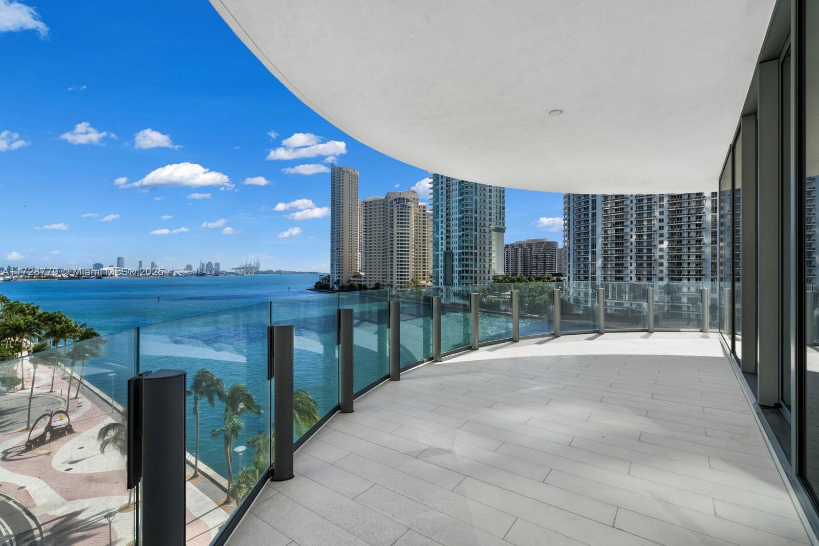 Luxurious corner unit featuring 4-bedrooms, 4.5-bathrooms, spans an impressive 3,360 sqft of meticulously designed interior space. This sought after line has a 631 sqft terrace with views of Biscayne Bay, the Miami River, & the Miami skyline. Every detail has been thoughtfully curated with custom finishes, including premium marble flooring, state-of-the-art kitchen with Bulthaup cabinetry, and Gaggenau appliances. Large open living space with floor-to-ceiling windows flood the home with natural light & showcase stunning vistas. Enjoy private elevator access and world-class amenities such as a fitness center, spa, expansive pool deck, salons & lounges, and an onsite marina for waterfront living at its finest. Seize the opportunity to live in one of Miami’s most coveted luxury buildings.