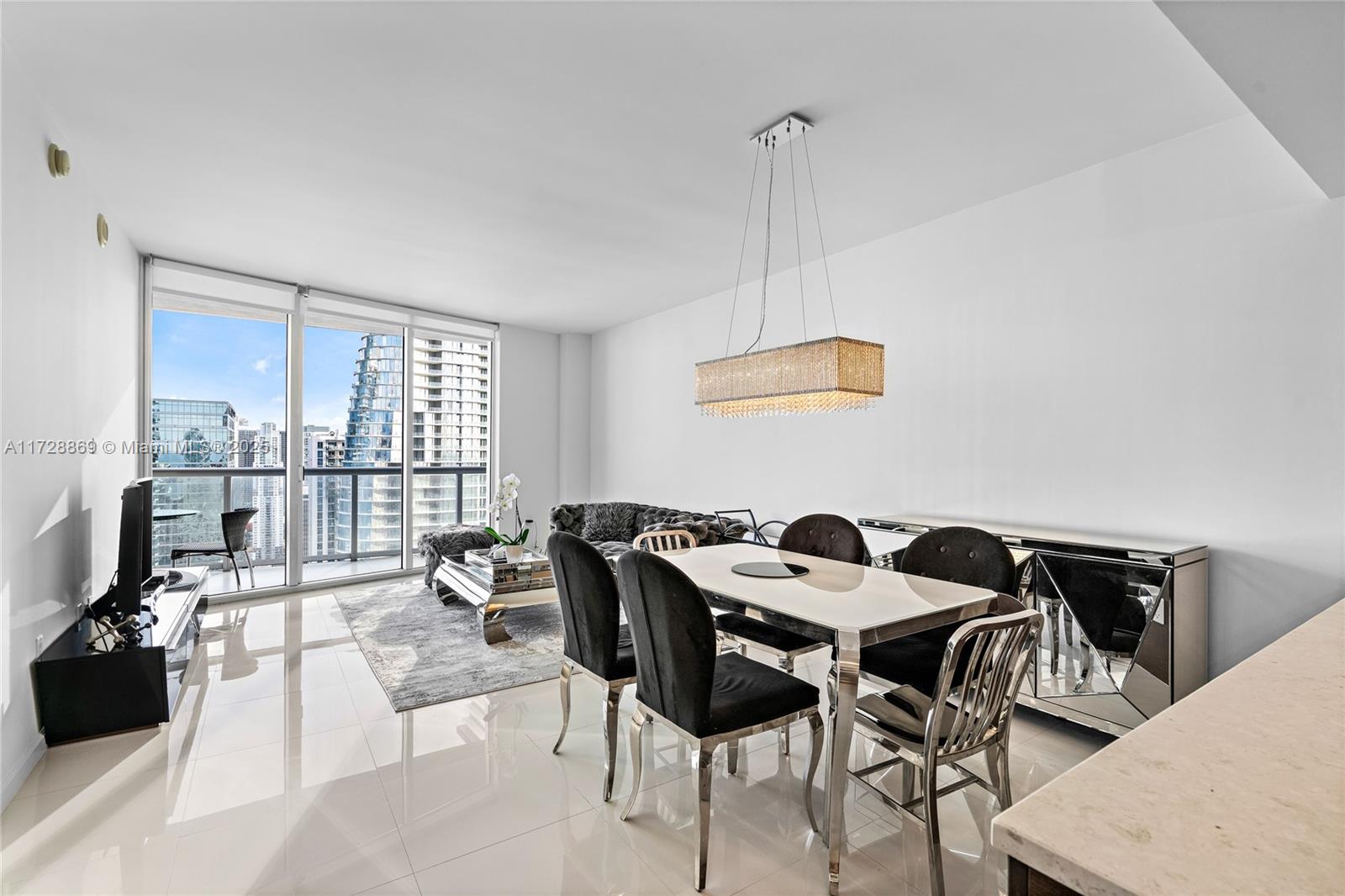 Fully furnished 1-bed, 1-bath condo with spectacular high-floor views. Enjoy Miami skyline, Miami River, and
Biscayne Bay vistas in Brickell's premier luxury building. The unit is freshly painted floor-to-ceiling impact windows,
Italian kitchen, and top-tier Bosch, NEW Wolf stove-top, NEW dishwasher and Subzero appliances. The bedroom
includes blackout shades and a walk-in closet. Rent covers Internet, cable (2 TVs), water, and parking. Five-star
amenities like a spa, fitness center, and Olympic-sized infinity pool. Fine dining nearby with proximity to Brickell
City Center, Mary Brickell Village, Whole Foods, and Bayfront Park. Move-in ready, fully furnished – perfect for out-of-state renters. Minimum 1-year lease required.