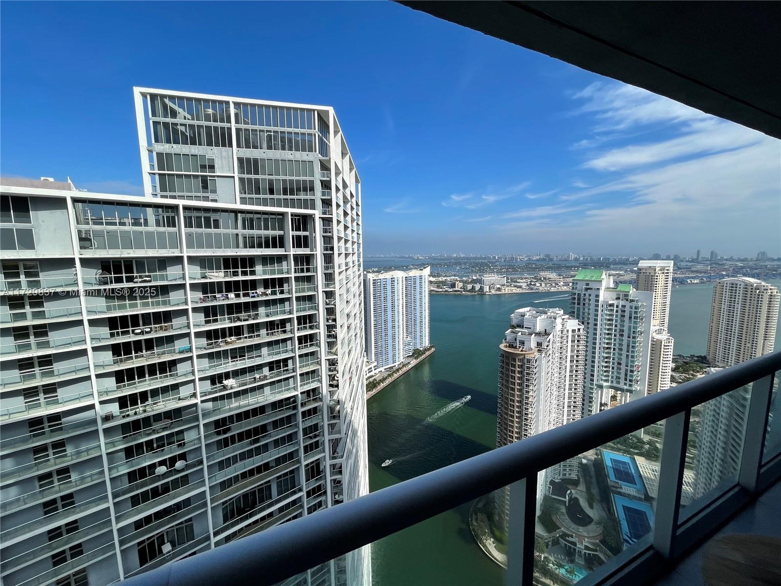 Beautiful water & city views from this modern 1bd/1ba unit at Icon Brickell Tower 2! Marble floors thru-out, window treatment & closet already set up, gourmet kitchen with Italian cabinets and top of the line appliances. Live in a 5 star building designed by Philippe Stark with gorgeous amenities including a beautiful spa, huge Infinity pool, state of the art fitness center, and many more.  Assigned parking included.