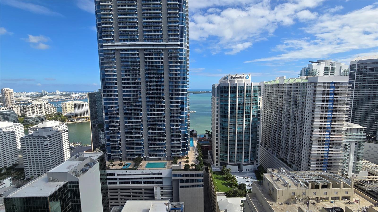 *LARGE* 900+ sq ft unit up with BEAUTIFUL VIEWS FROM THIS 36TH FLOOR BALCONY- 1 Bed / 1 Bath / 1 Guest Bath / 1 Assigned Parking Spot and also valet service is offered - Overlooking Brickell Avenue, in the heart of the City of Miami with partial Biscayne Bay Views - Marble floors, Italian Cabinetry, Walk-in Closet, In-unit washer and dryer, Large Balcony - Condo Building features Pool, Spa, Fitness Center, Business Center, Billiard Room, Cigar room, 24/7 Concierge service, front desk and security - short-friendly distance to any and all shops & restaurants you will like to explore - Pets under 25 pounds are WELCOME ! - MOVE-IN READY BY MARCH 1st, 2025. Management on site with fast approval.