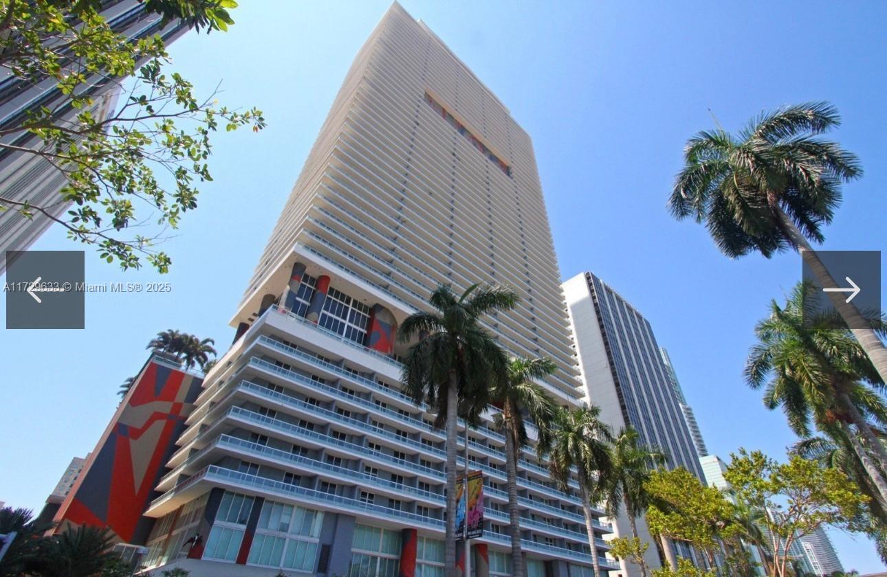 BEAUTIFUL CORNER UNIT WITH PANORAMIC VIEWS OF BAYFRONT PARK, PORT OF MIAMI, AMERICAN AIRLINES ARENA. ONE LARGE MAIN BEDROOM WITH BUILT-IN BED, SECOND BEDROOM IS A DEN THAT IS ALSO CONNECTED TO THE BATHROOM. WRAP AROUND BALCONY WITH BEAUTIFUL VIEWS FROM ALL AREAS OF THE APARTMENT. BUILDING OFFERS MANY AMENITIES, POOL, VALET PARKING, CONVENIENT ACCESS TO METRORAIL DOWNTOWN MIAMI, BRICKELL, SHOPS AND RESTAURANTS .