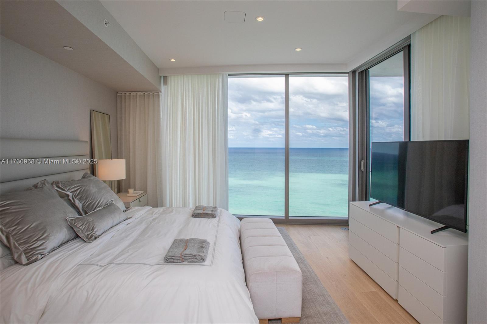 Ritz Carlton Residences in Sunny Isles Beach. This 2 bedroom plus den apartment features beautiful luxury designer finishes and furniture den works as 3rd bedroom. Enjoy the exceptional hotel-style services of the Ritz Carlton at home and the exclusive 5 star amenities, include: poolside restaurant, beach service, oceanfront fitness center, spa, kids room, security, valet, and concierge. Vacant and ready to move in fully furnished and equipped