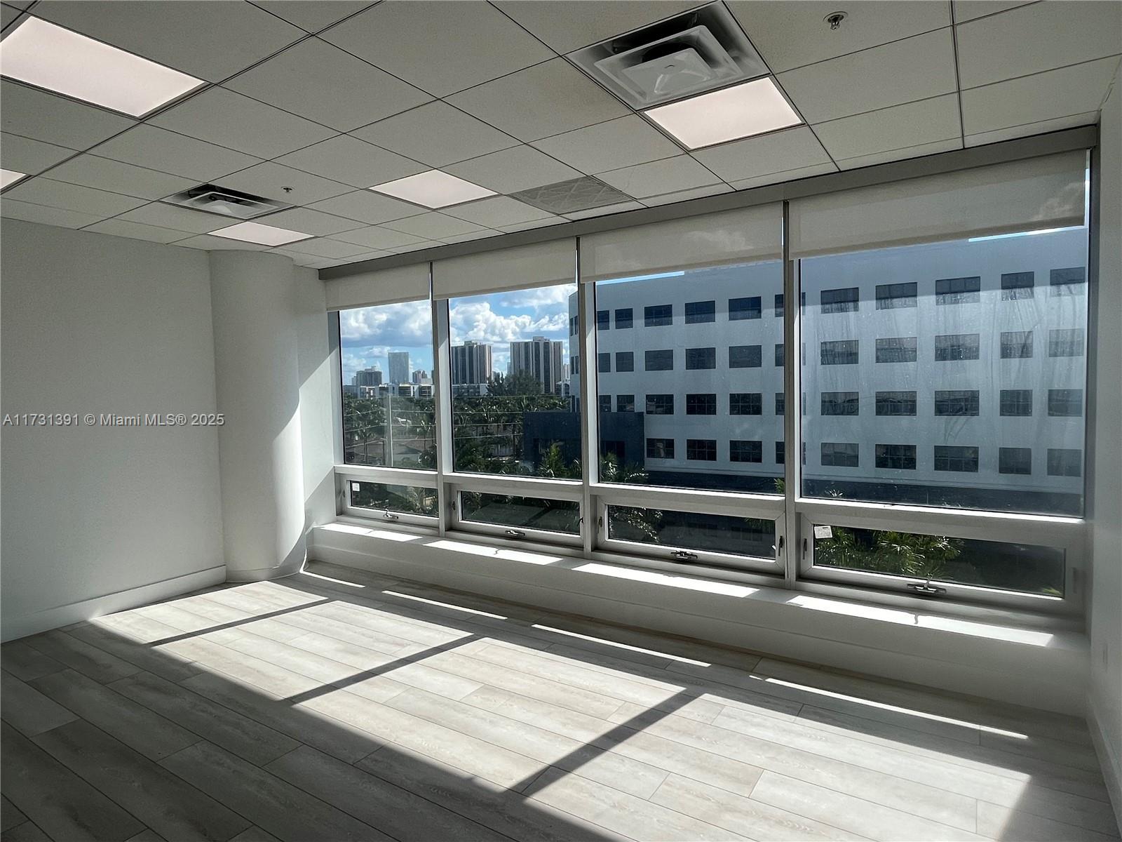 Condominium offices. The building has 24-hour access, gym, wi-FI, a lobby with a 20-foot ceiling, ample parking,
individual meters, and climate control. The space has 1600 rentable square feet.