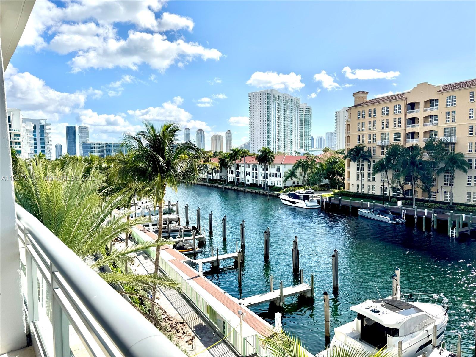 Stunning duplex in the prestigious Artech building, designed by renowned architect Carlos Ott, in the heart of Aventura. This modern unit features two floors filled with natural light, spacious balconies/terraces on both levels overlooking the canal and Intracoastal. Sleek white floors, wood stairs, marble bathrooms, and a full kitchen, exudes contemporary elegance. Unit includes 2 ensuite bedrooms, a 3rd full bath, & a den on the first floor that can serve as an office or 3rd bedroom.Wallpapered walls and top-tier finishes add a refined touch. Enjoy world-class amenities: Gym, spa, pool, tennis court, racquetball, cinema, party room, marina (up to 110 ft), 24-hour concierge, and valet.Perfectly located near schools, dining, shopping, & entertainment ideal as home or investment opportunity