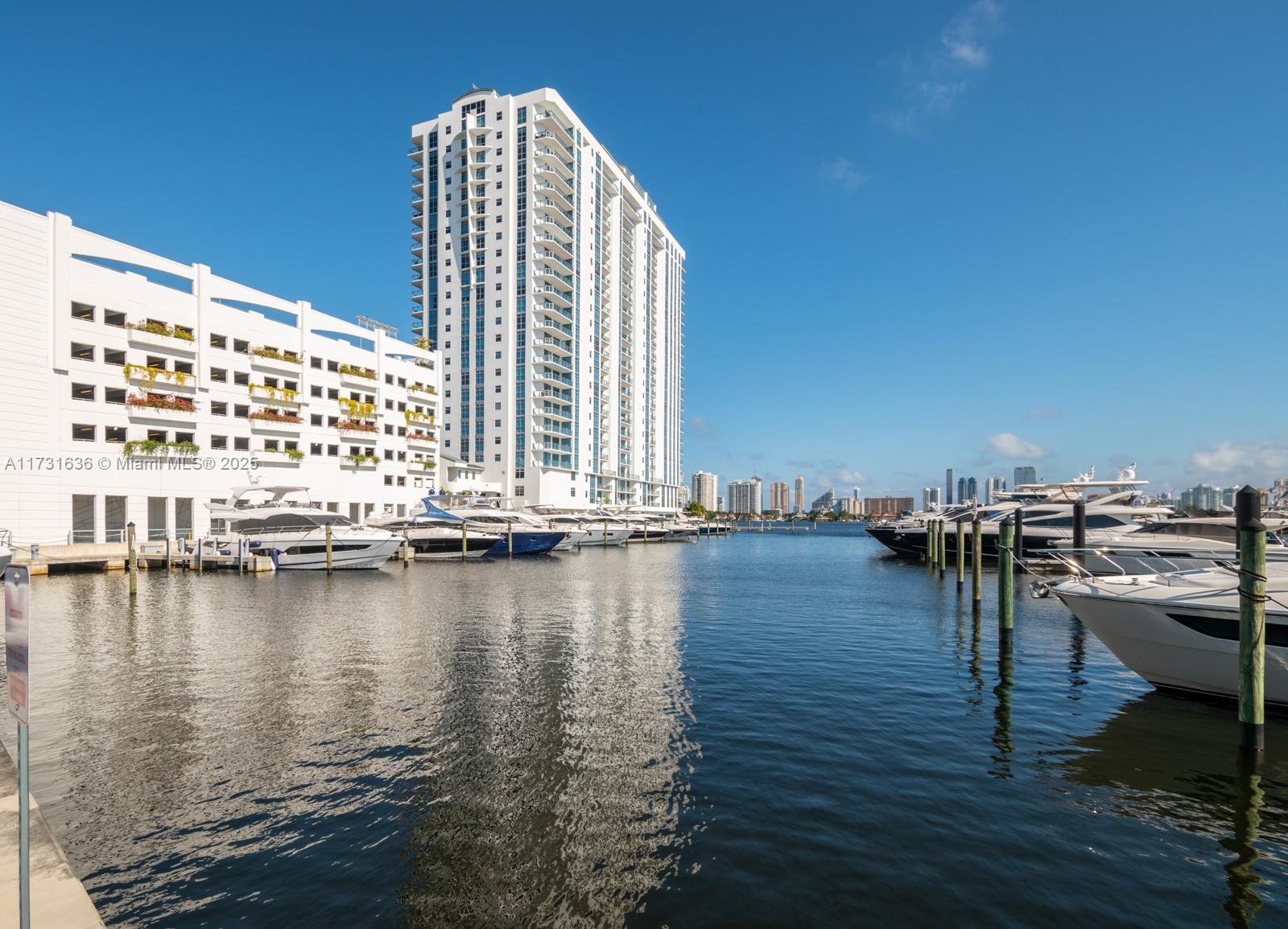 Experience luxury living in this beautifully upgraded corner unit at Marina Palms. This 3-bedroom, 3.5-bathroom residence spans over 2,200 SF and boasts a highly desirable southeast exposure with breathtaking water views. Designed with elegance, it features custom Italian flooring, Colombian woodwork, and an open-concept kitchen with Snaidero Italian cabinetry, quartz countertops, and premium Sub-Zero & Wolf appliances. The master suite offers a spa-like bath with a freestanding soaking tub. Enjoy a private terrace, full-sized washer/dryer, and over $200K in upgrades. Includes 2 parking spaces and a storage unit. Residents enjoy world-class amenities like a full-service marina, infinity pool, gym, pilates room, kids and teens playroom & concierge. Minutes from beaches, shopping and dining