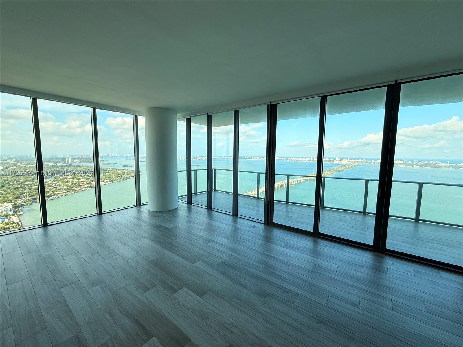 Stunning luxury building on the Bay front with unparalleled amenities. Spectacular corner Penthouse offering unobstructed WOW views, skyline, cruise ships, sunrise and sunsets. Complete privacy for the living room, primary bedrooms & baths facing the Bay/Ocean. 2 huge balconies. Upgraded kitchen has Wolf/Subzero appliances. High ceilings. Private elevator foyer. All bedrooms have own bathrooms including Office/maid's room plus a powder room. Laundry room has a sink & extra storage. 2 adjacent prime garage spaces & huge storage room. Found oasis in the city, rare 3 acre resort deck: 3 pools, private cabanas, summer kitchen, BBQs, tennis courts, various lounges, secluded areas, movie theater, business center, kids playroom, indoor jacuzzi, saunas, massage, gym, yoga, cigar lounge, billiards.
