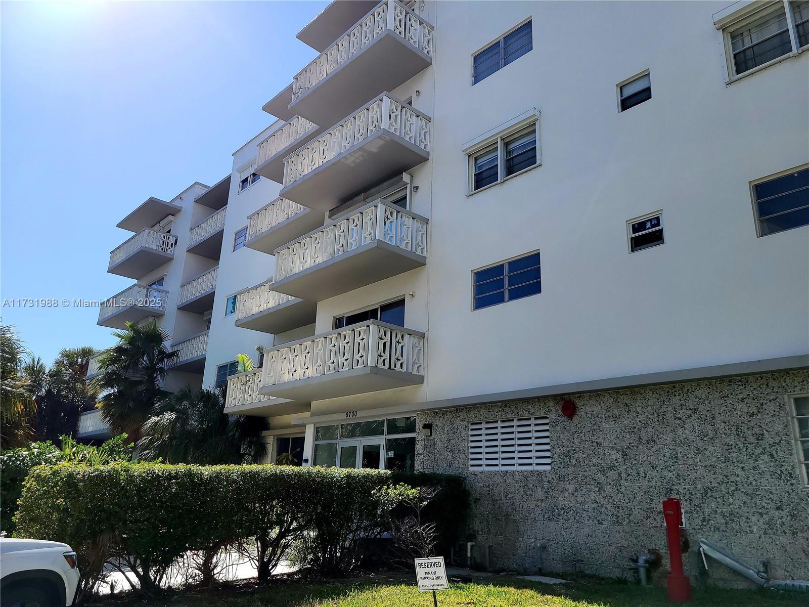 Top floor apartment. Large 1 bedroom, 1 and a half bath. 919 sq ft. Private balcony overlooking East Bay Harbor Drive. Distant view of the canal. Facing North. Original terrazzo flooring which was recently polished to bring back the charm. Unit is updated and move-in ready. Lots of closet space (1 by entry, 1 in the hallway and 1 walk-in). Can rent after 1 year of ownership. Very low maintenance fees of $402 per month. Building has elevator, pool, beautiful lobby and open-air courtyard. Lots of updates done in the last 5 years. Buyer to take over special assessment of $156 per month. 1 assigned parking space on 97th street. SELLER FINANCING AVAILABLE WITH 30% DOWN.