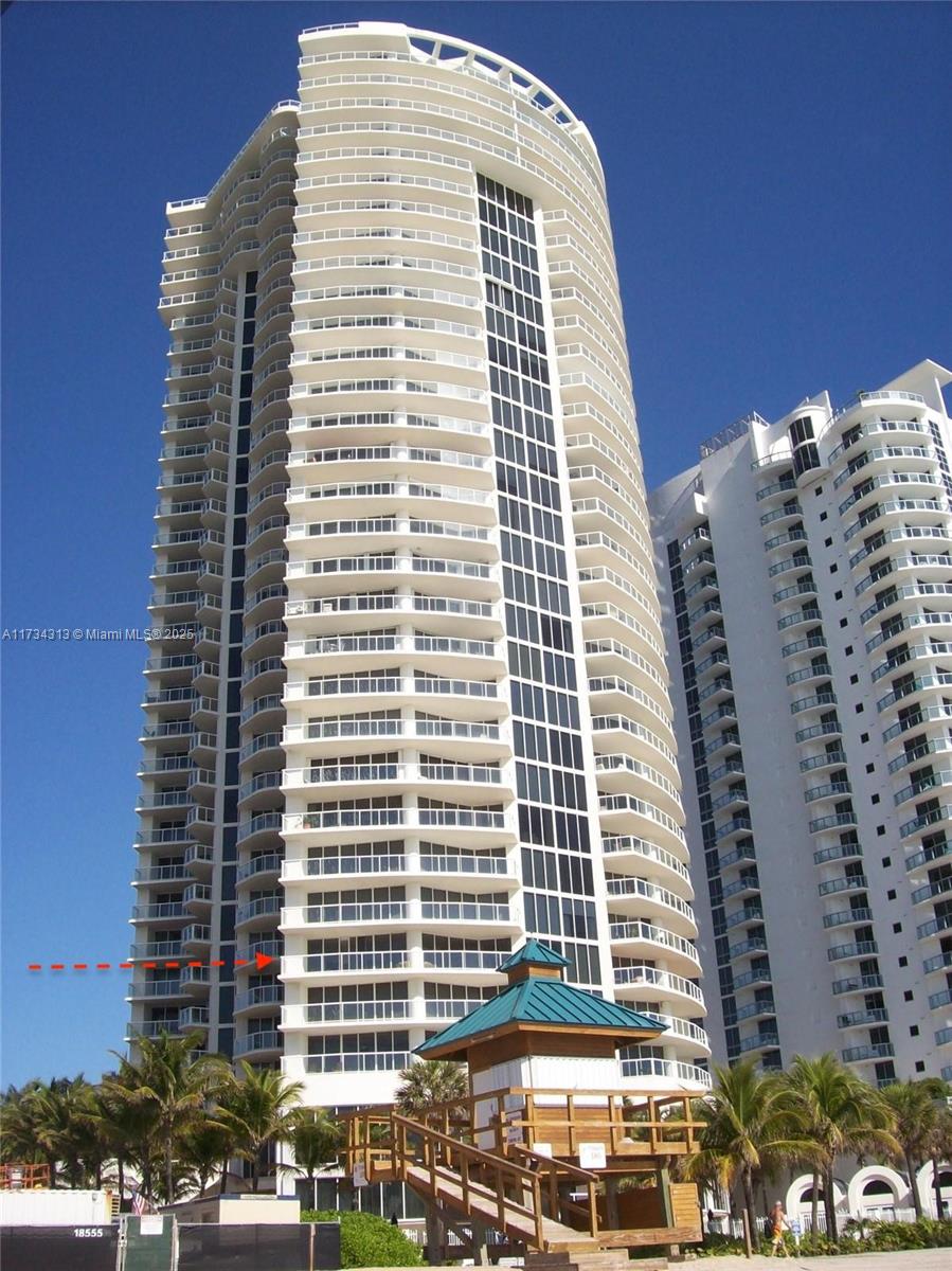 Millennium Condo / Sunny Isles Beach / Breathtaking panoramic views from this gorgeous low floor unit / 3 Beds plus Den / 3.5 Baths / Unit has over 2,200 sq. ft. plus balconies, and offers private elevator foyer entrance / Tastefully remodeled, marble and wood floors throughout. Upgraded and contemporary kitchen with top of the line appliances. Amenities include 24 hrs security & valet, tennis court, putting green, gorgeous new pool and Jacuzzi, fitness center, massage room, beach & pool service, party room, spa, dog walk area, BBQ, and playground.