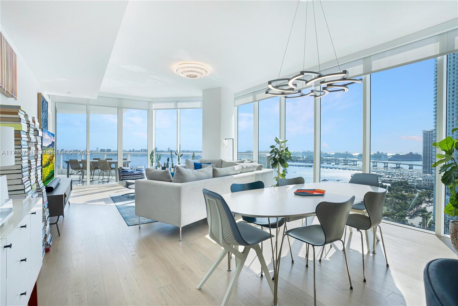 This sun-drenched home has breathtaking views of Biscayne Bay in the most desirable line at the prestigious Paramount Bay. Renovations for this unit include new hardwood flooring, complete kitchen remodel (kitchen cabinetry, Wolf oven, cooktop & hood, Sub-Zero refrigerator & bev. center, countertops & island), complete primary bathroom remodel, new light fixtures, new window treatments (motorized in living/primary), and a new washer/dryer. Other features include an overabundance of wall space for art, 500+ SQFT balcony, 1 garage space + valet, and a storage unit. Enjoy the privacy of your own elevator lobby, 24-hour security, and front desk services. Building amenities include 2 pools with cabanas + towel service; a fitness center + spa; barbecue picnic areas; and a children’s playroom.