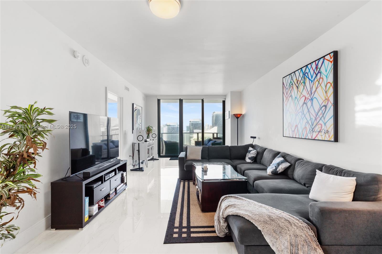 Beautiful and spacious two bedroom plus den corner unit in the heart of Brickell. One of the best floor plans at SLS Brickell. Expansive wrap around balcony that boasts sunlight from every corner. Floor to ceiling windows to enjoy the best views that Brickell has to offer. European kitchen fully equipped with Sub Zero Refrigerator and top of the line appliances. Unit also has a den which could be used as an office or guest room. Amazing amenities include a gym, pool, spa, sauna, party room, rooftop pool, valet parking and 24-hour valet service. Location, location, location! Located in the middle of it all easy access to Brickell City Centre, Mary Brickell Village, restaurants, supermarkets, quick access to i95 and much more within walking distance. Unit is tenant occupied until July 2025.