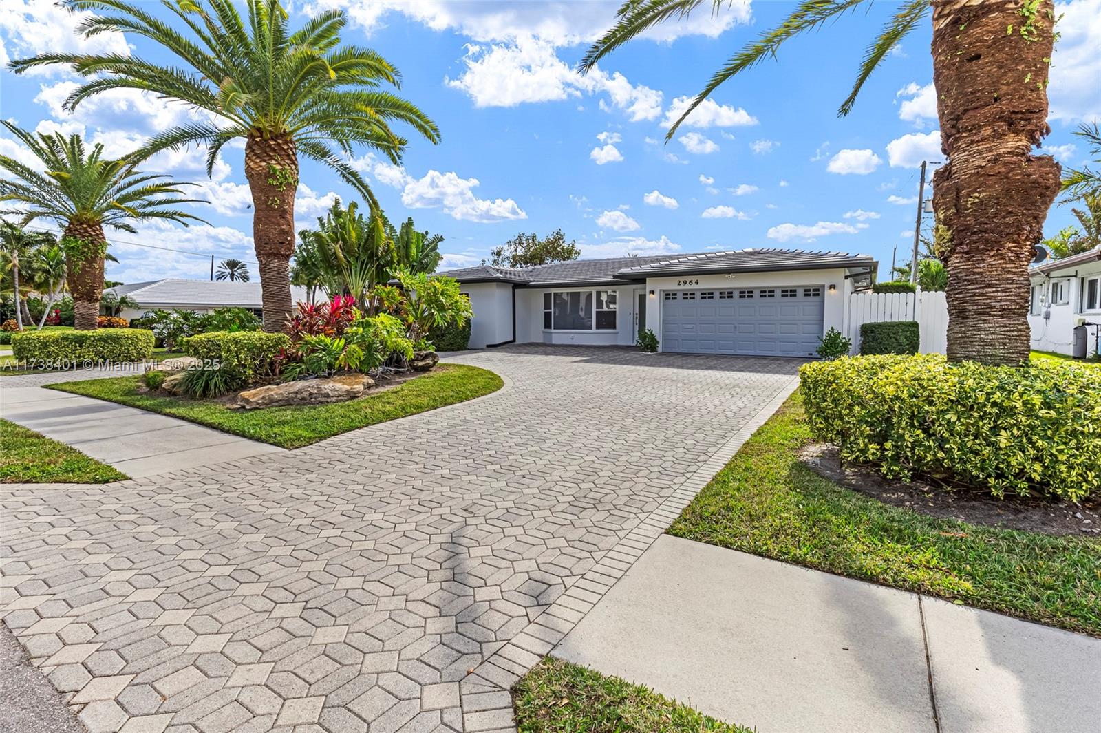 Welcome to your dream home in Lighthouse Pointe! This stunning single-family home boasts 3 bedrooms, 2 bathrooms, and a 2-car garage, perfect for a growing family or those who love to entertain. Step outside to your own private oasis with an in-ground pool and paved backyard, ideal for enjoying the Florida sunshine. The interior features stainless steel appliances, tile flooring, custom closets, and a quartz kitchen counter, providing a modern and luxurious feel throughout. With a new tile roof, new AC, and hurricane impact windows and doors, you can rest easy knowing your home is protected. Situated on a corner lot, this home offers privacy and ample space for outdoor activities. Completely renovated in 2024, this home is move-in ready and waiting for you to make it your own.