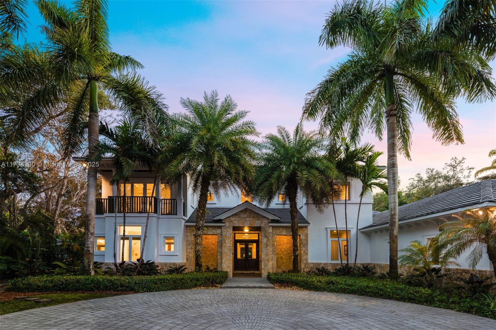 This exquisite 2-story gated estate, built in 2007, seamlessly combines luxury, comfort, and privacy in Pinecrest’s highly coveted location. Nestled behind a gated entrance, this 7-bedroom, 7.5-bathroom residence, with manicured lush landscaping enhancing the curb appeal.  Inside, expansive living spaces feature soaring ceilings, elegant finishes, and abundant natural light. The primary suite located on the first floor is a private retreat with a spa-like ensuite, walk in closets, and dual sinks. The gourmet island kitchen boasts Sub-Zero appliances, marble countertops, and wood cabinetry, seamlessly connecting to open living and dining areas. Outdoors, enjoy a beach entry pool, basketball court, and three-car garage, all within a resort-style setting.