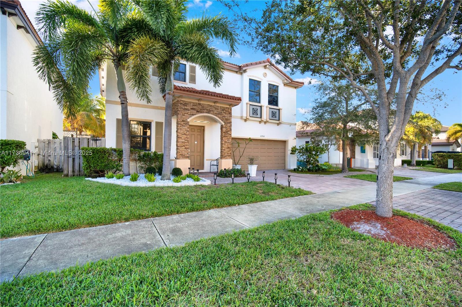 Beautiful two-story home located in the desirable Enclave at Cutler Bay! This home features 4 BR and 2 full BTH on the second floor. 3 rooms w/walk-in closets. Master BR with double walk-in closets, and a generously sized bathroom w/double sinks, separate shower, and tub. The second full BTH also features double sinks and a shower/tub combination. A convenient half bathroom is located on the first floor for guests. Modern open kitchen and family room w/granite countertops are perfect for entertaining. The formal dining room and separate living room add extra space for gatherings. Tile flooring on the first floor, laminate wood floors on stairs and the second floor. New A/C unit installed in May 2023. The backyard offers plenty of room for an underground pool. Low Association fee!