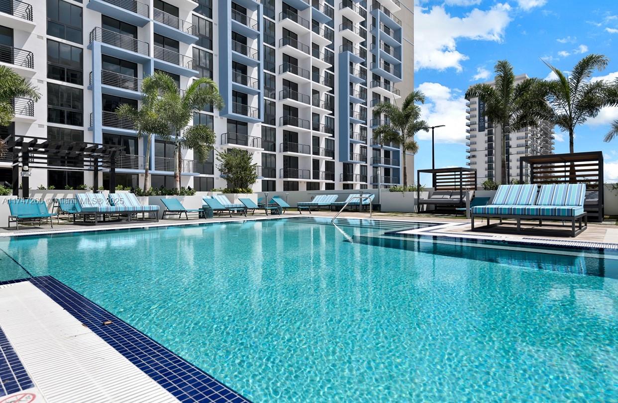 Beautiful two-key unit, with a spectacular view to the park and Miami sky line. 3 bedroom, 3 bath condo in the heart of vibrant Downtown Doral. This spacious unit offers modern elegance and open floor plan, perfect for both relaxation and entertainment. Resort-style amenities, including gym, pool, play room, business center, and much more. 2 assigned parking spaces and 1 convenient storage. Just steps away, from A+ schools, restaurants, stores, and supermarkets. Easy access to the major expys.  826, and FL Turnpike. Short term rental allowed. Ideal for investors.