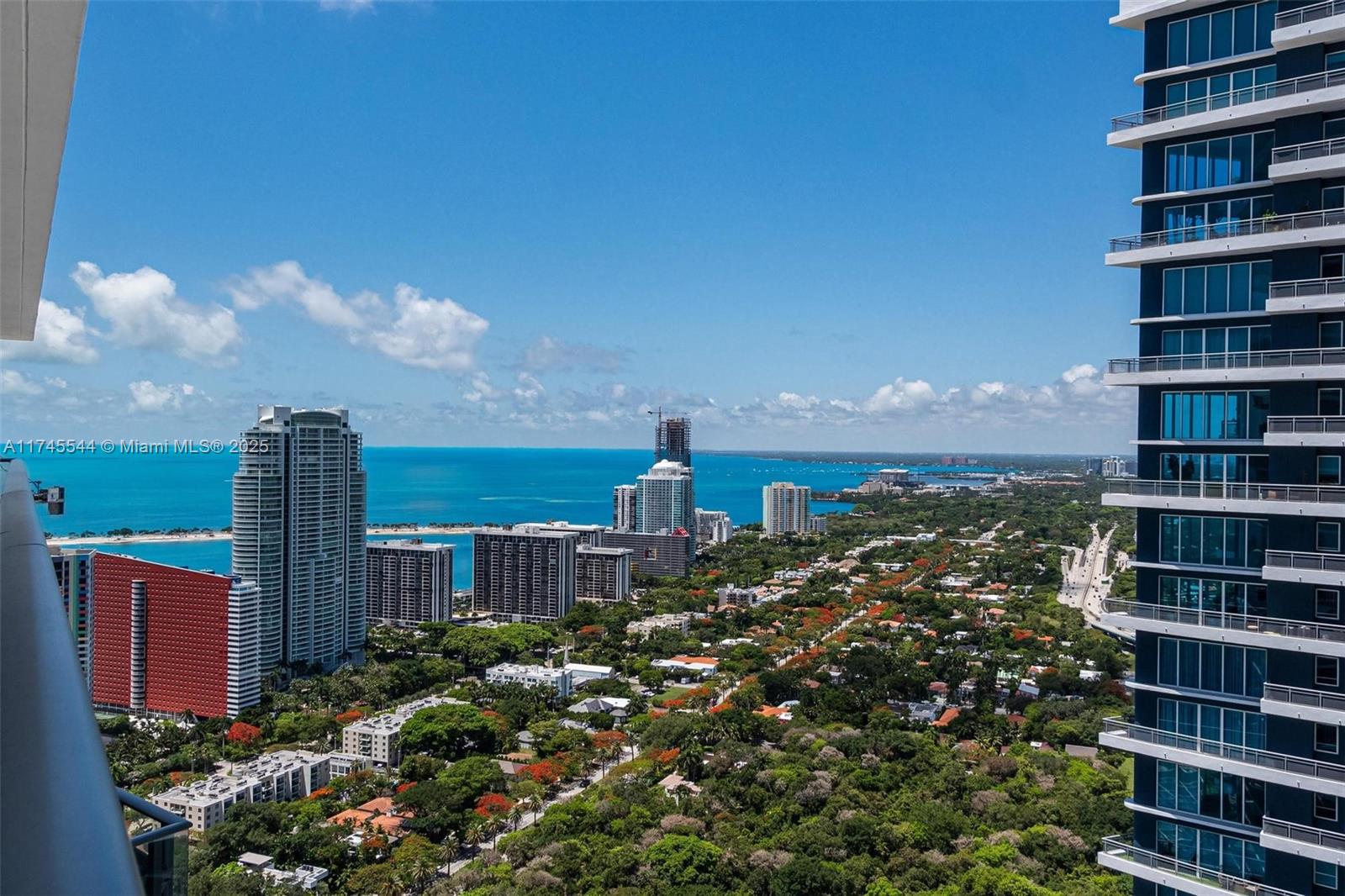 Experience luxury urban living at SLS Brickell. This high-floor residence features bright interiors with porcelain tile and glass walls leading to a spacious terrace with bay and skyline views. The European kitchen is equipped with quartz countertops and Bosch appliances. Enjoy amenities such as 24/7 concierge, fine dining, a spa, fitness center, theater, and rooftop pool. Located near Mary Brickell Village, Brickell City Centre, museums, and the Arsht Center, with beaches just minutes away.